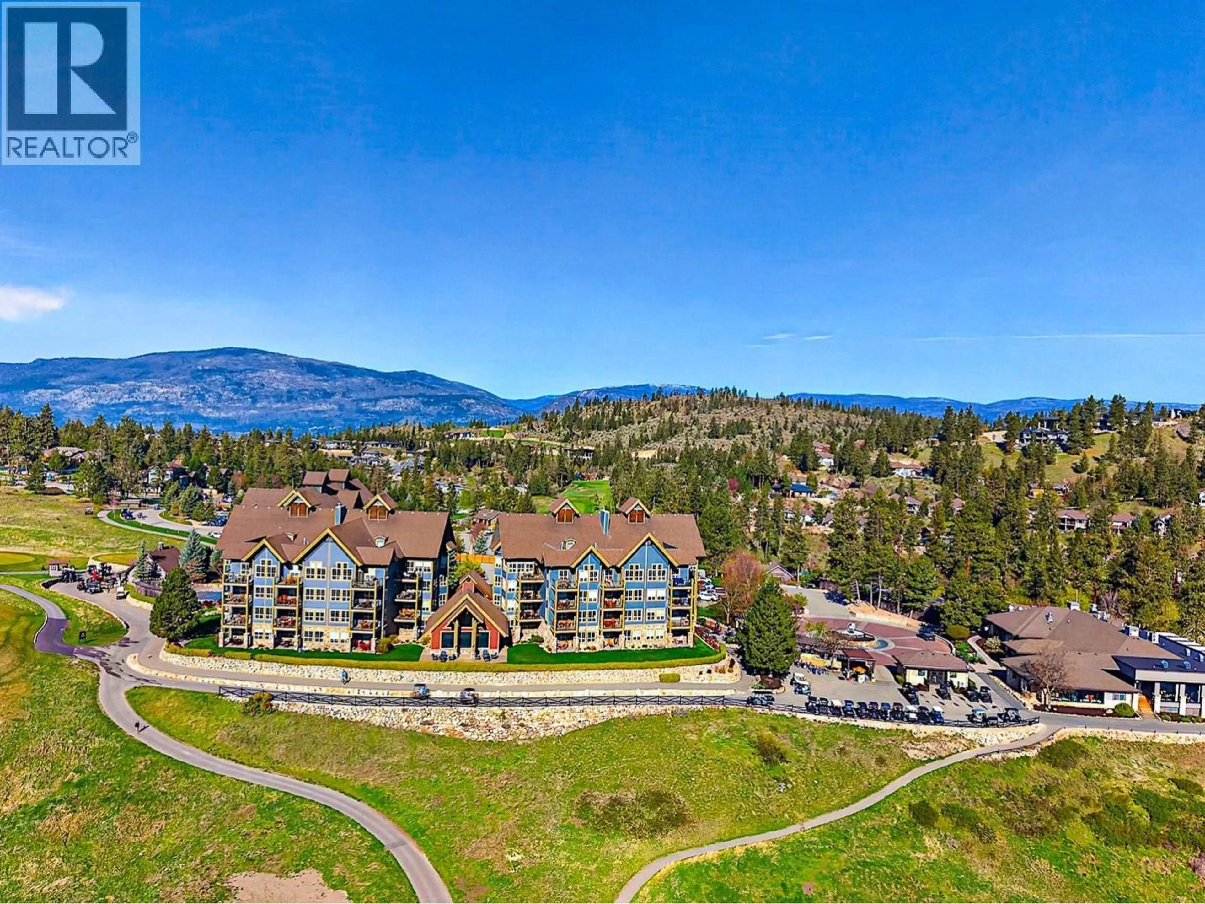 A pic from outside/outdoor area/front of a property/back of a property/a pic from drone, mountain view for 232 - 101 VILLAGE CENTRE COURT, Vernon British Columbia V1H1Y8