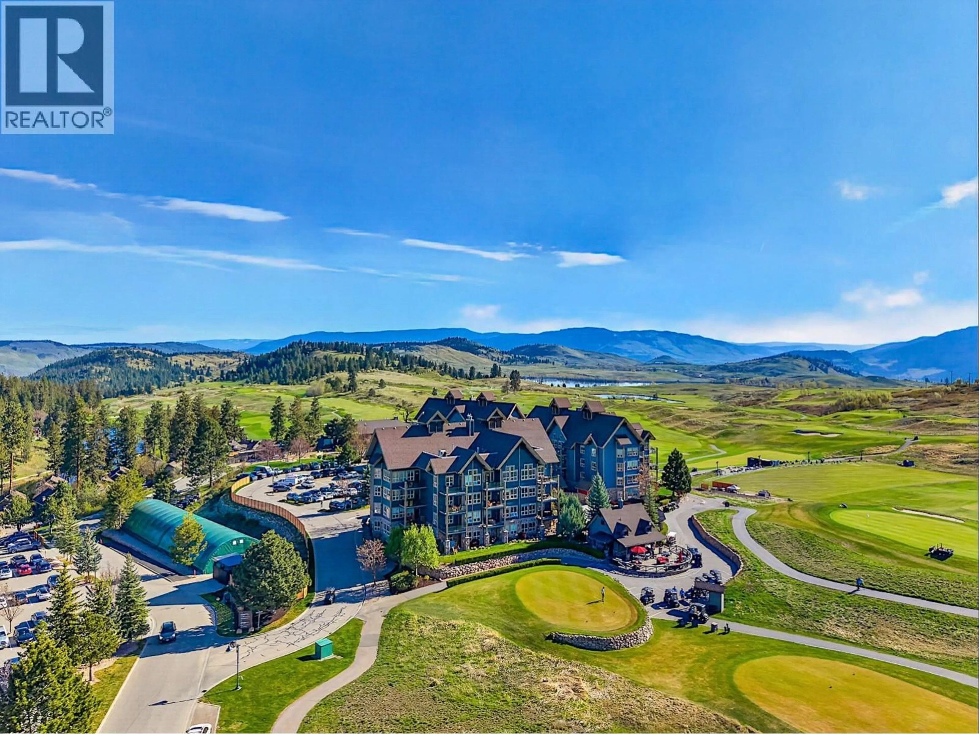 A pic from outside/outdoor area/front of a property/back of a property/a pic from drone, mountain view for 232 - 101 VILLAGE CENTRE COURT, Vernon British Columbia V1H1Y8