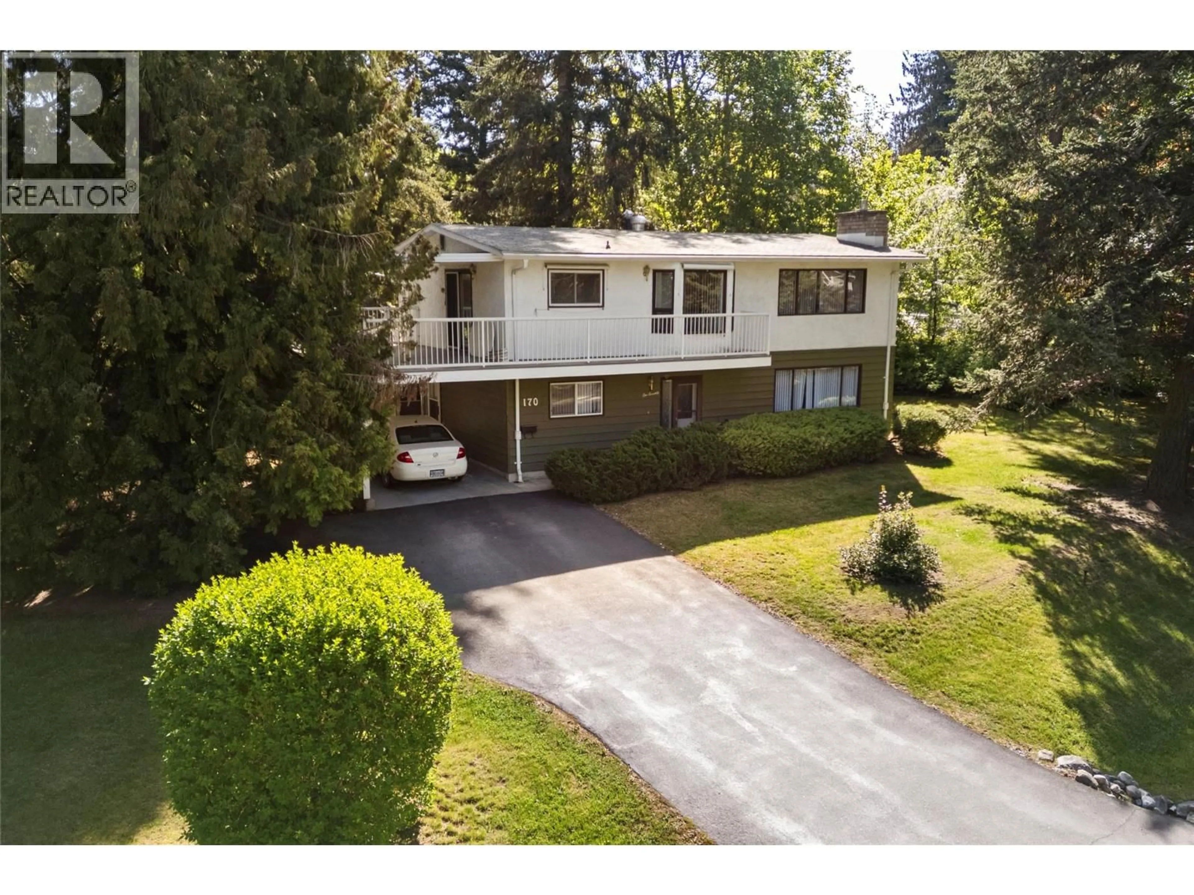A pic from outside/outdoor area/front of a property/back of a property/a pic from drone, street for 170 25TH STREET NORTHEAST, Salmon Arm British Columbia V1E2A8