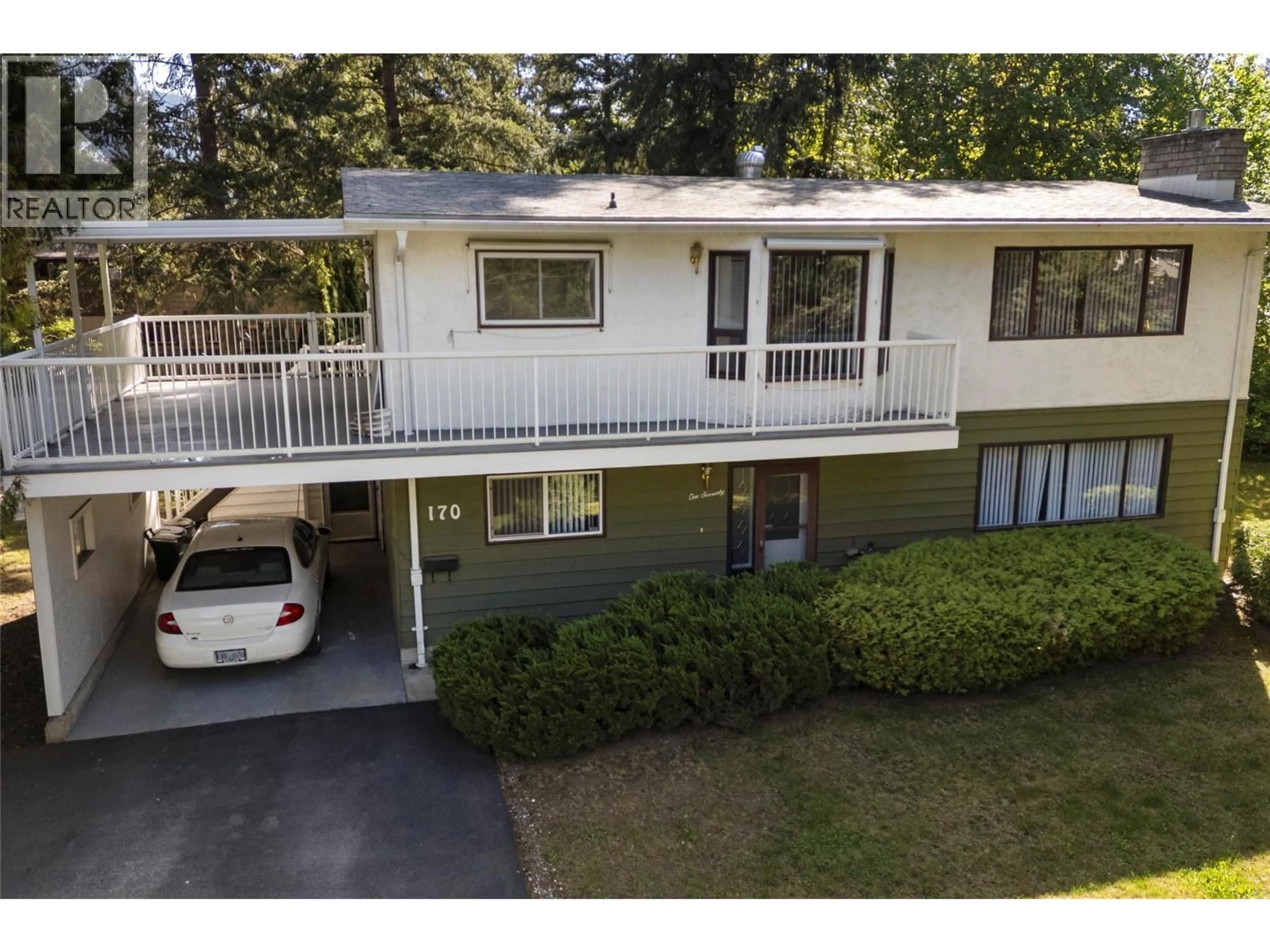 A pic from outside/outdoor area/front of a property/back of a property/a pic from drone, street for 170 25TH STREET NORTHEAST, Salmon Arm British Columbia V1E2A8