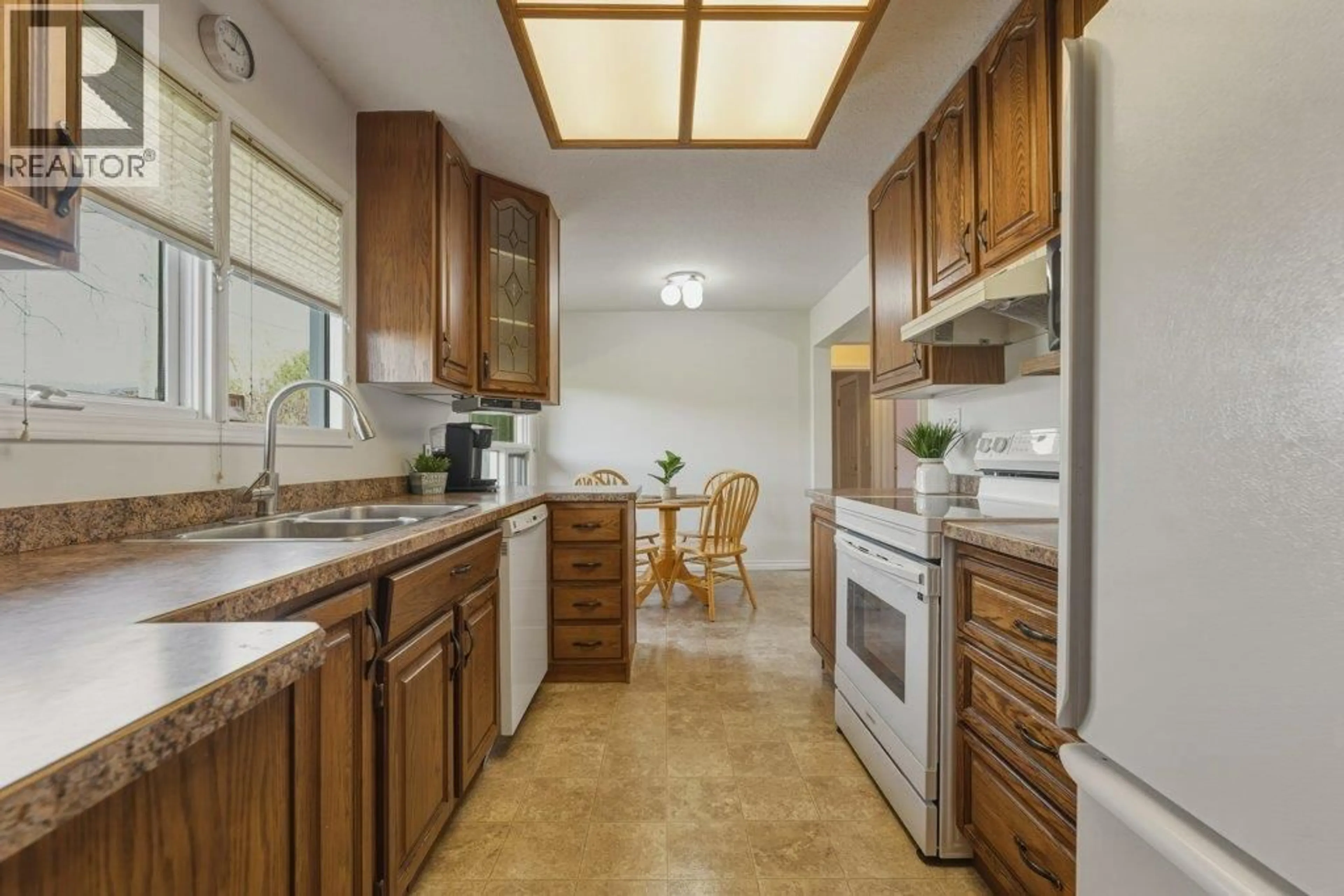 Standard kitchen, ceramic/tile floor for 8203 KALAVISTA DRIVE, Coldstream British Columbia V1B1K4