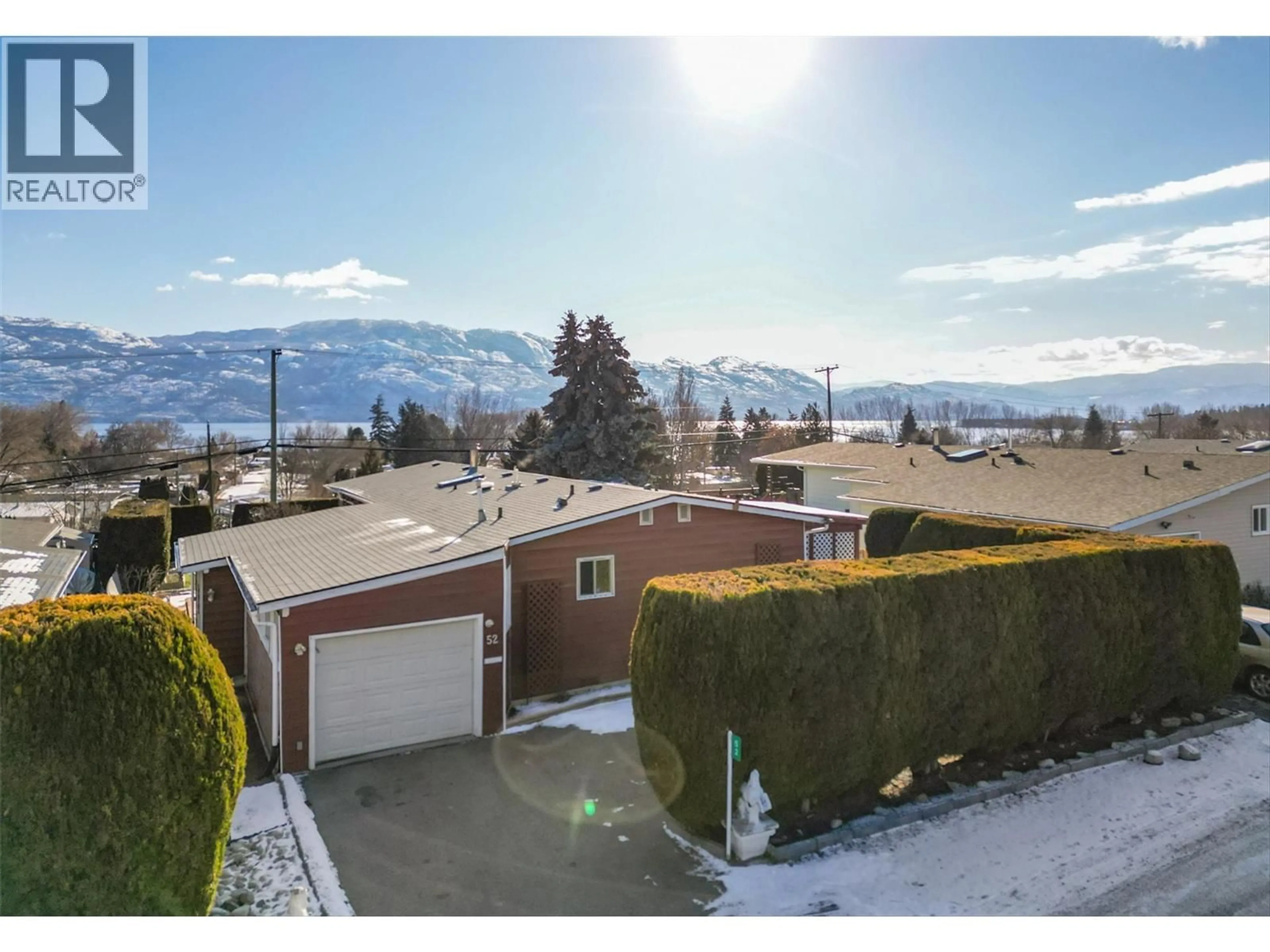 A pic from outside/outdoor area/front of a property/back of a property/a pic from drone, mountain view for 52 - 2098 BOUCHERIE ROAD, West Kelowna British Columbia V4T2A5