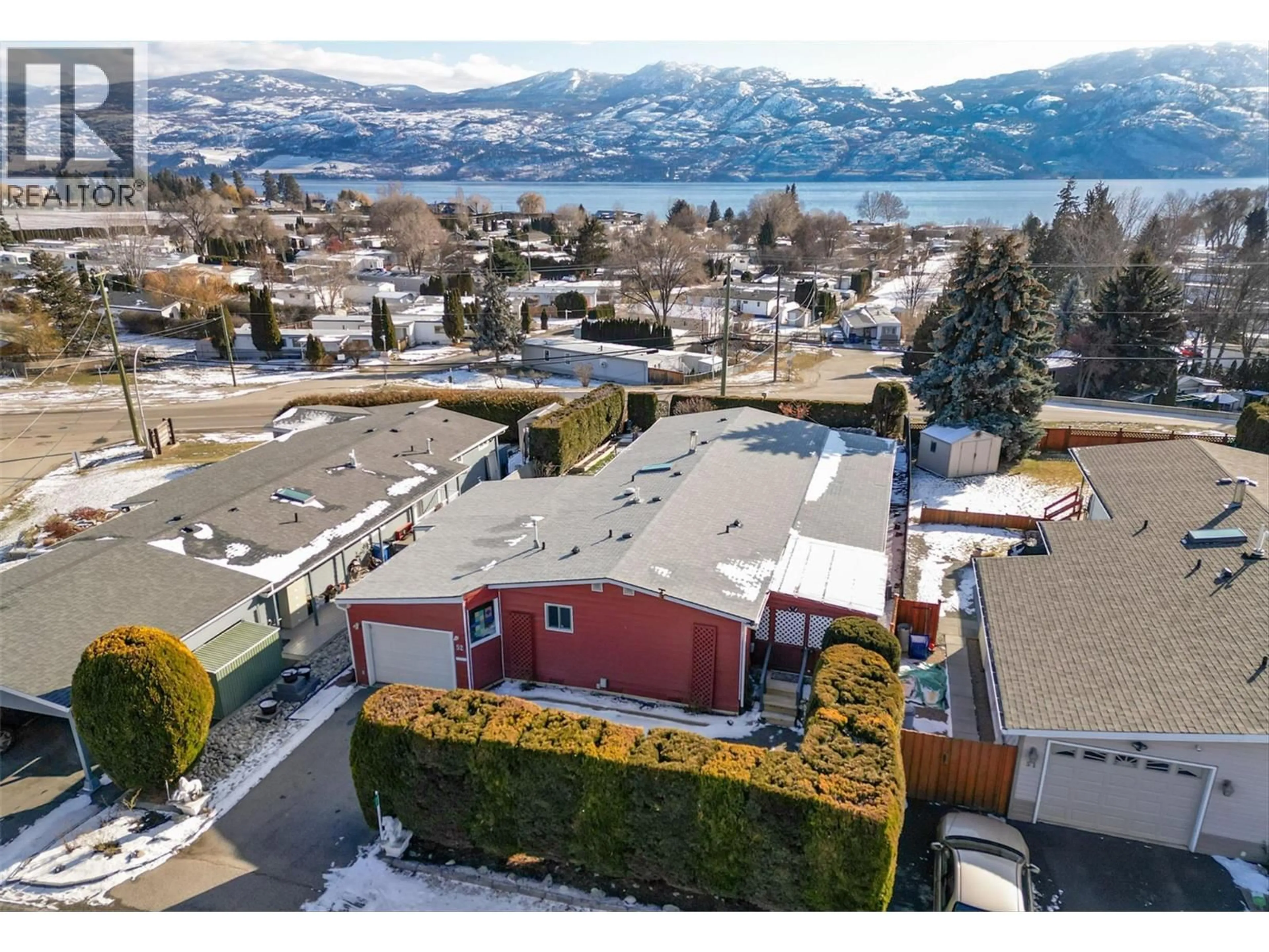 A pic from outside/outdoor area/front of a property/back of a property/a pic from drone, mountain view for 52 - 2098 BOUCHERIE ROAD, West Kelowna British Columbia V4T2A5