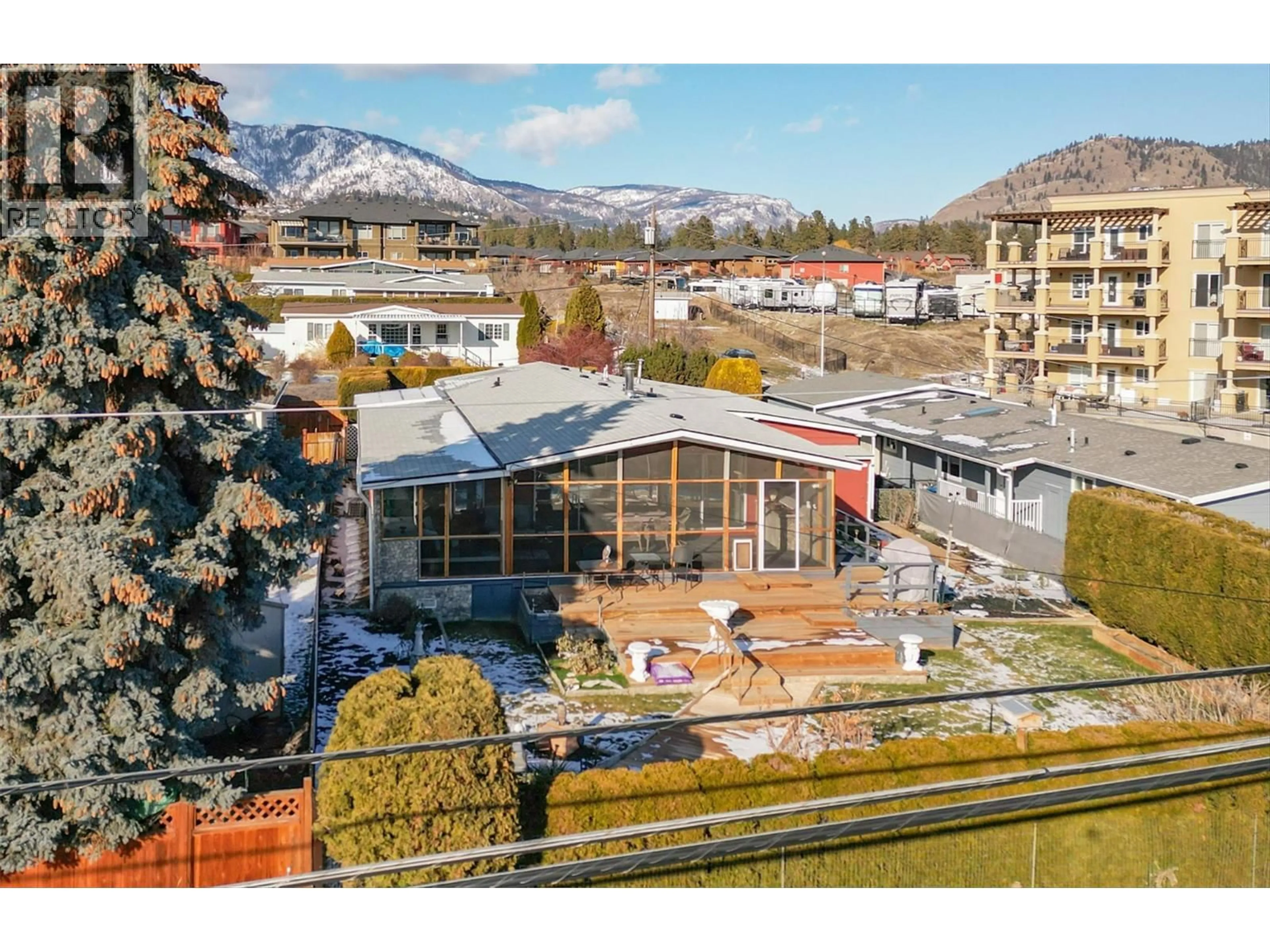 A pic from outside/outdoor area/front of a property/back of a property/a pic from drone, mountain view for 52 - 2098 BOUCHERIE ROAD, West Kelowna British Columbia V4T2A5