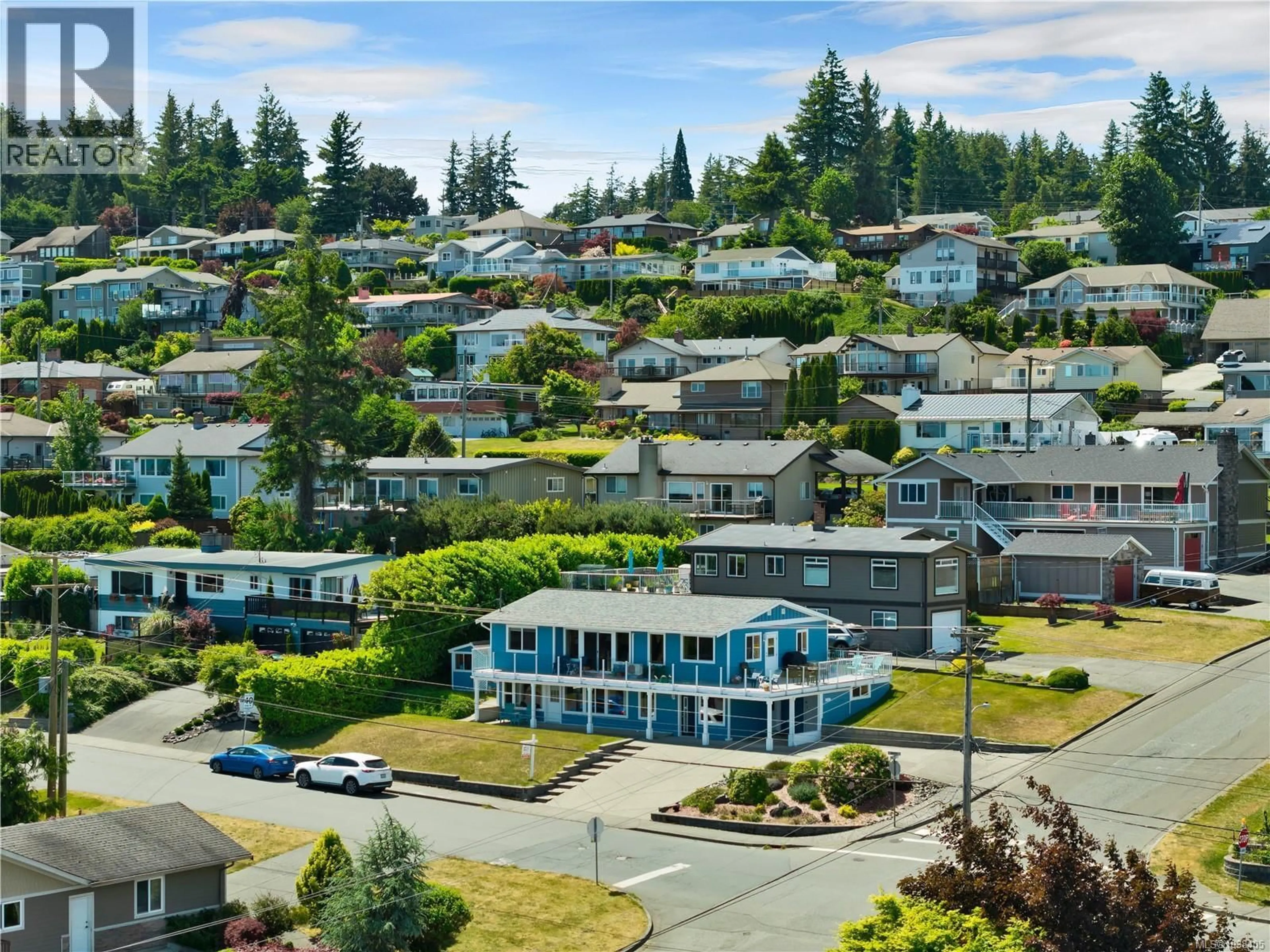 A pic from outside/outdoor area/front of a property/back of a property/a pic from drone, mountain view for 85 PINECREST ROAD, Campbell River British Columbia V9W7A8
