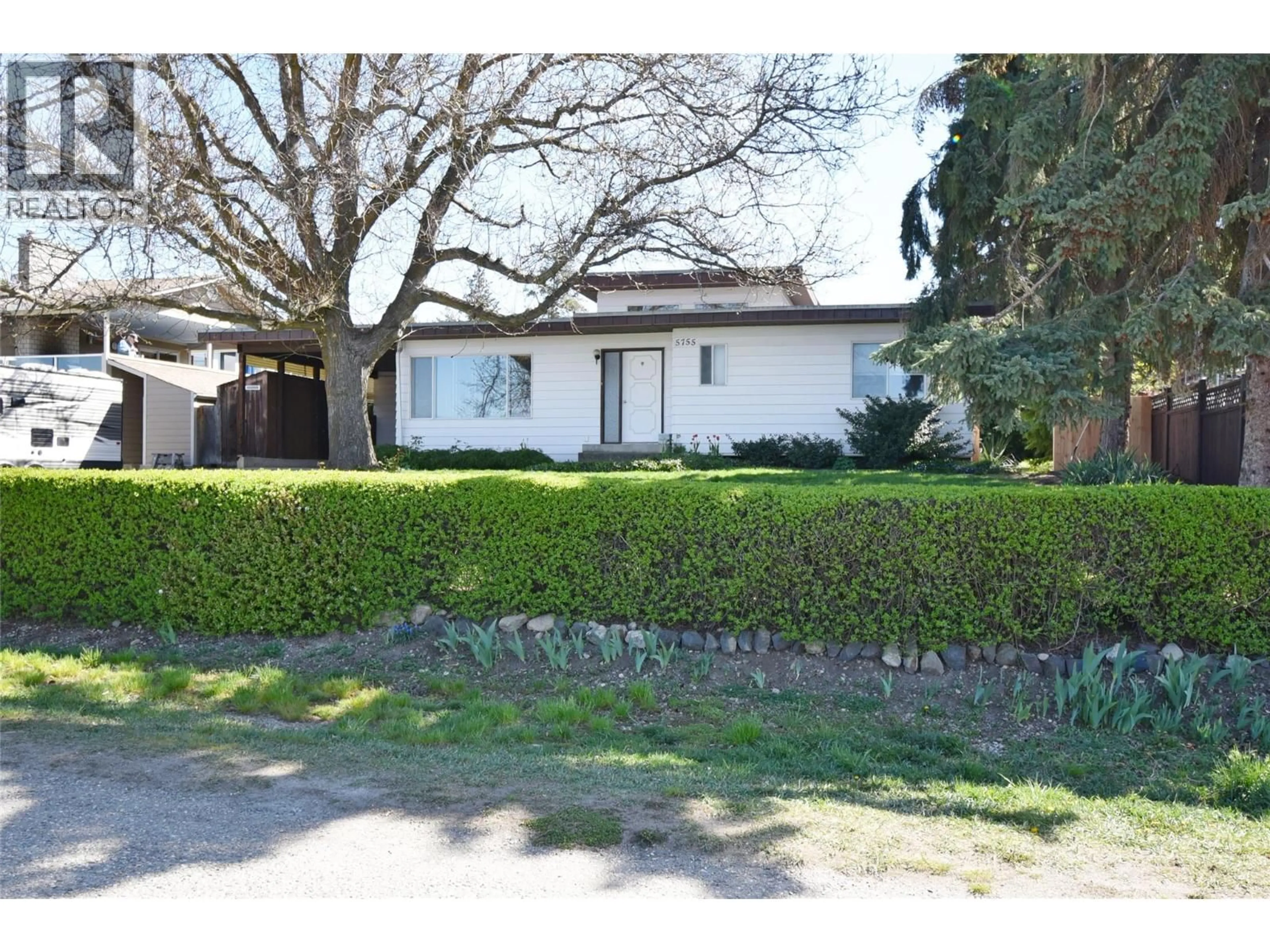 A pic from outside/outdoor area/front of a property/back of a property/a pic from drone, street for 5755 MCCLURE ROAD, Vernon British Columbia V1B3R1
