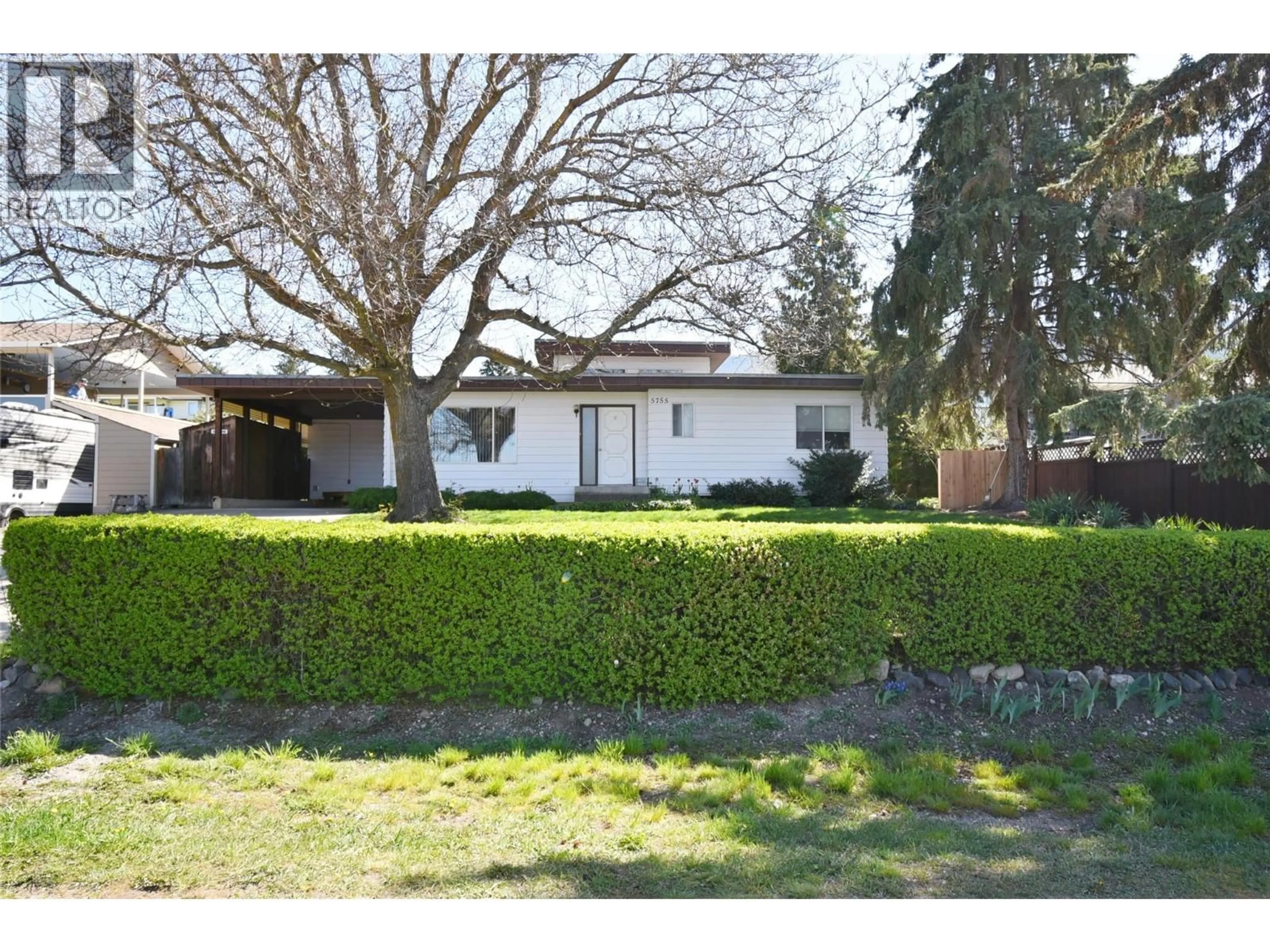 A pic from outside/outdoor area/front of a property/back of a property/a pic from drone, street for 5755 MCCLURE ROAD, Vernon British Columbia V1B3R1