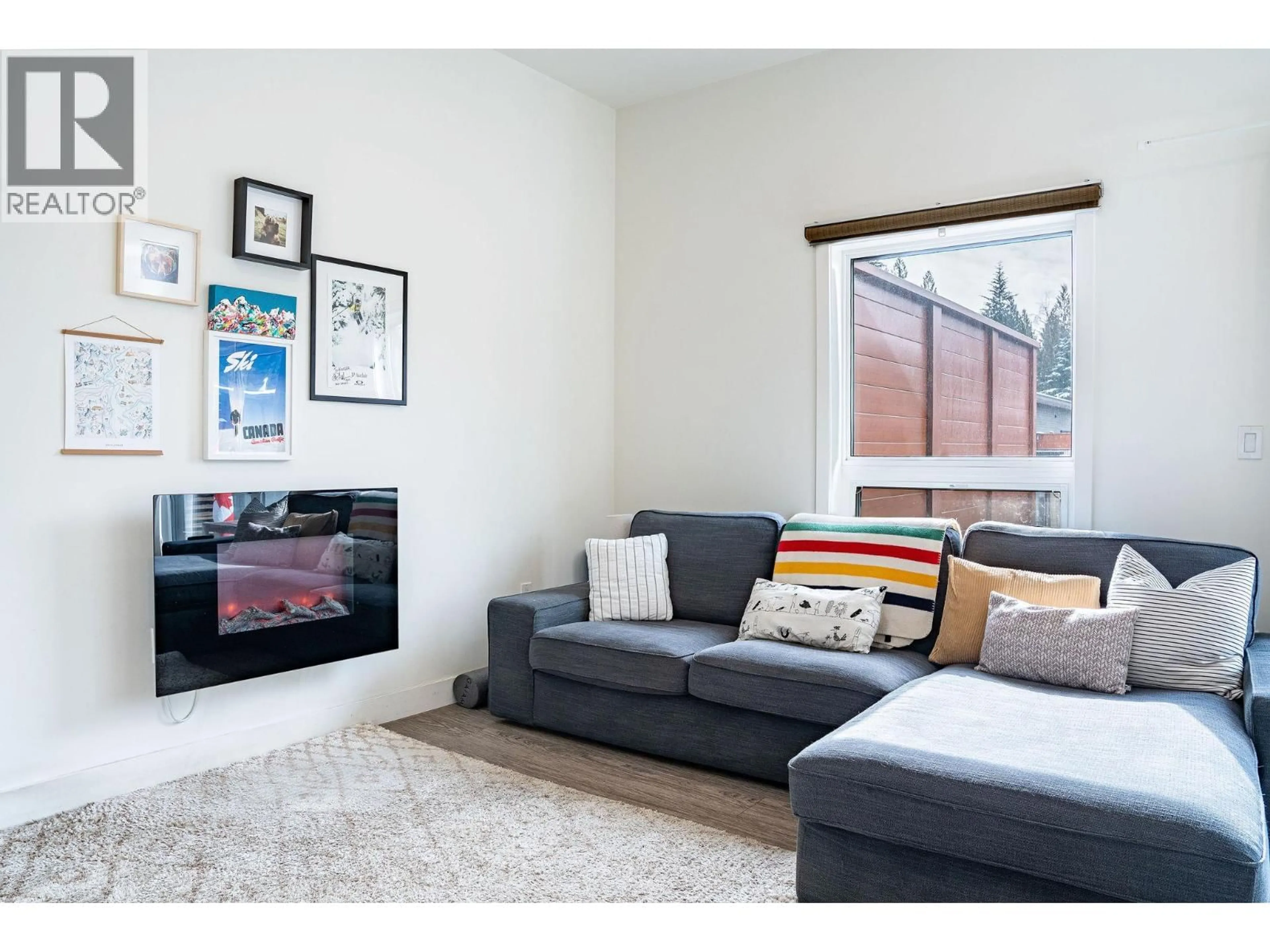 Living room with furniture, unknown for 1204 - 1901 NELS NELSON CRESCENT, Revelstoke British Columbia V0E2S3