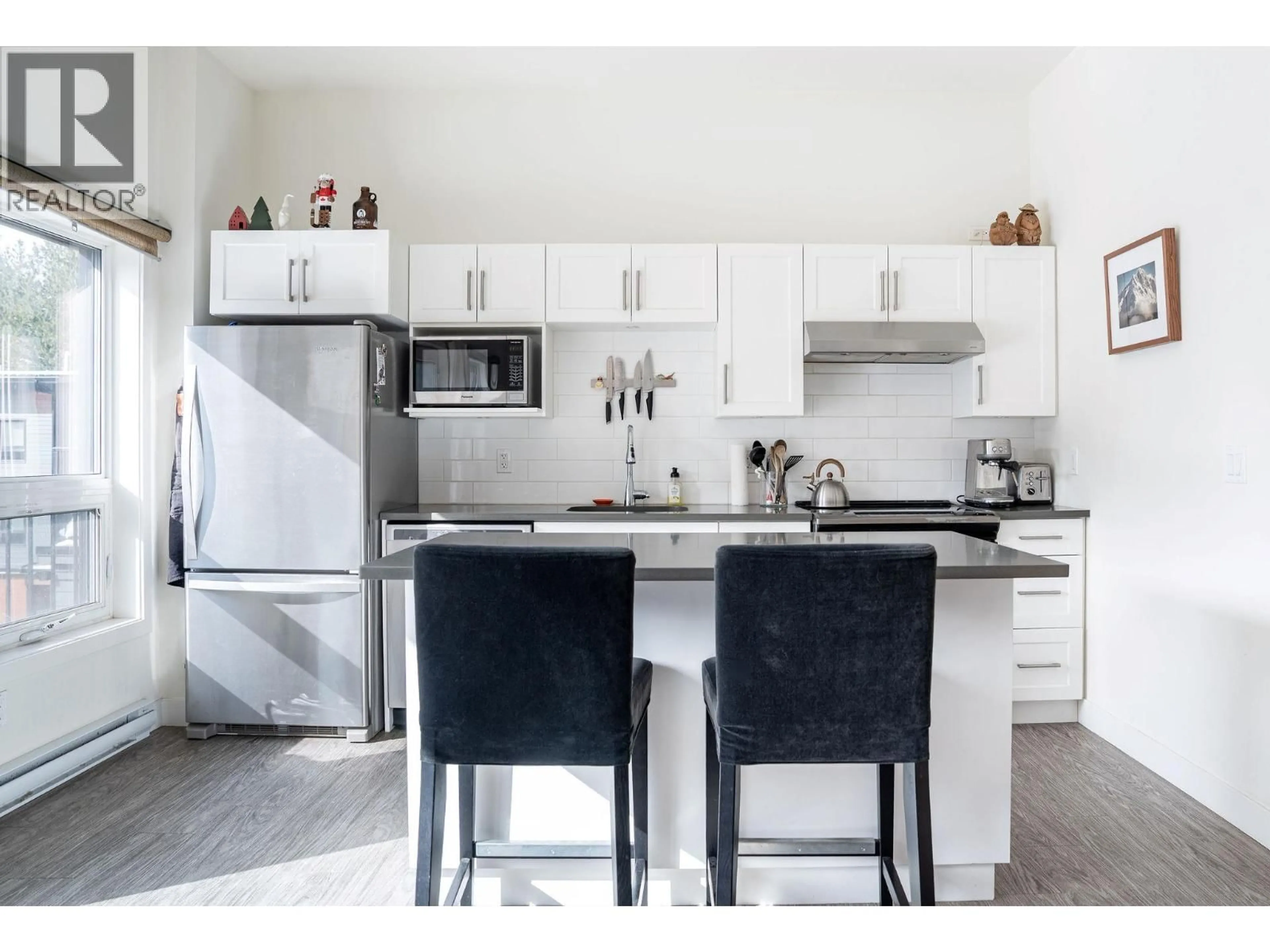 Open concept kitchen, ceramic/tile floor for 1204 - 1901 NELS NELSON CRESCENT, Revelstoke British Columbia V0E2S3