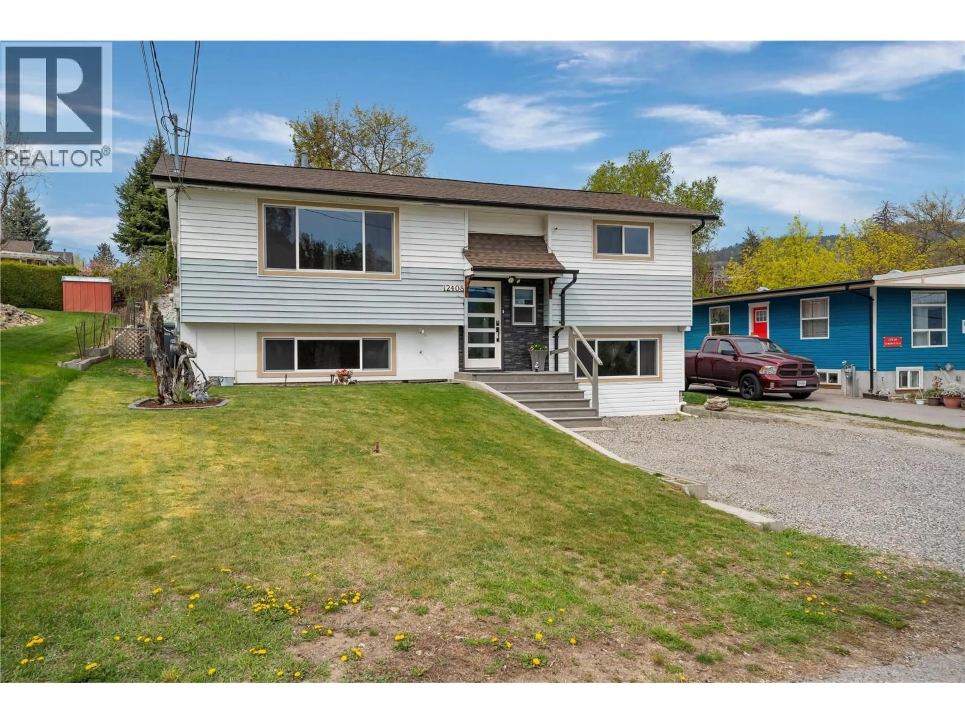 Home with vinyl exterior material, street for 12408 CAMPBELL CRESCENT, Summerland British Columbia V0H1Z0