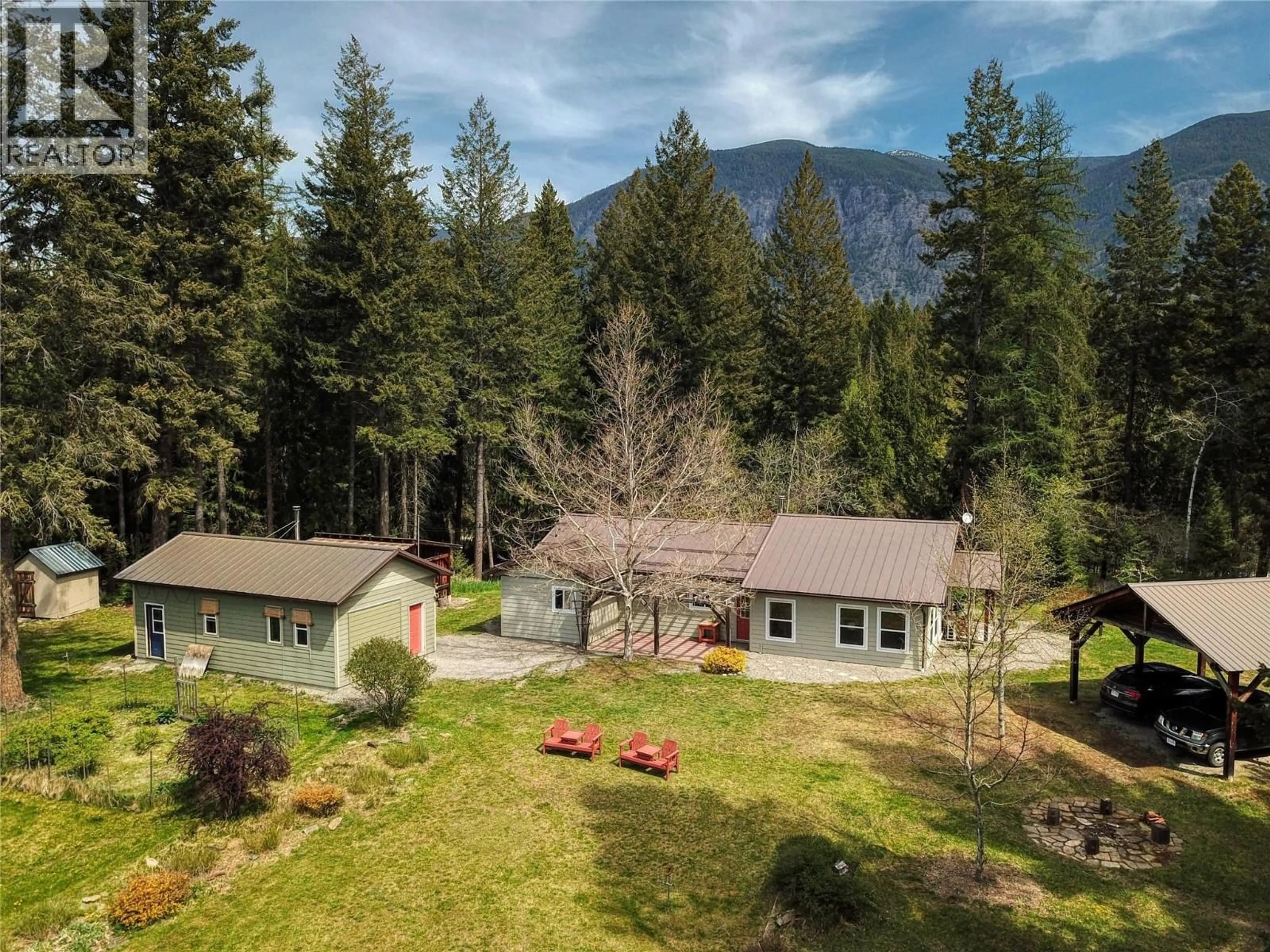 A pic from outside/outdoor area/front of a property/back of a property/a pic from drone, mountain view for 4039 ZAPP ROAD, Canyon British Columbia V0B1C1