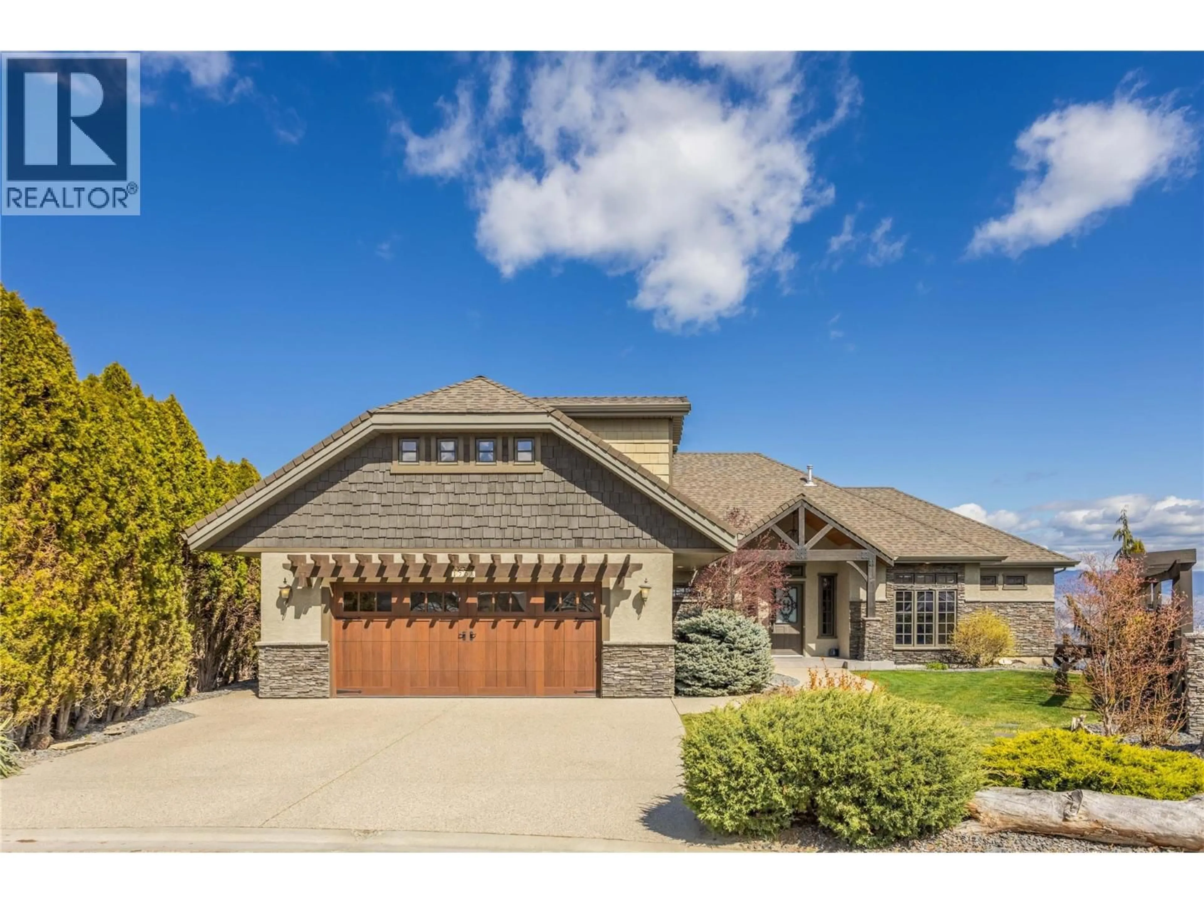Home with brick exterior material, street for 1208 PEAK POINT DRIVE, West Kelowna British Columbia V1Z4A9