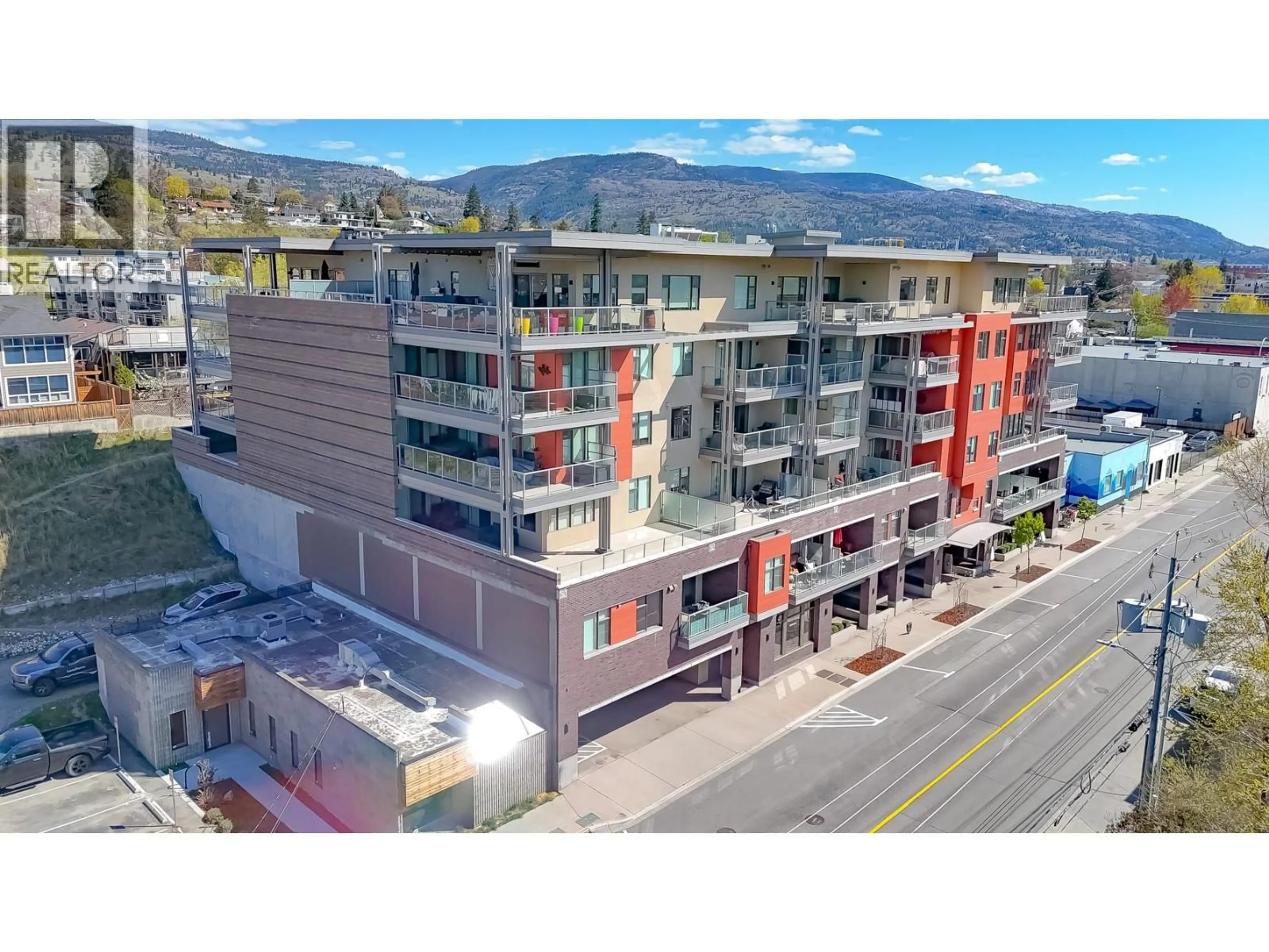 A pic from outside/outdoor area/front of a property/back of a property/a pic from drone, unknown for 304 - 110 ELLIS STREET, Penticton British Columbia V2A4L5