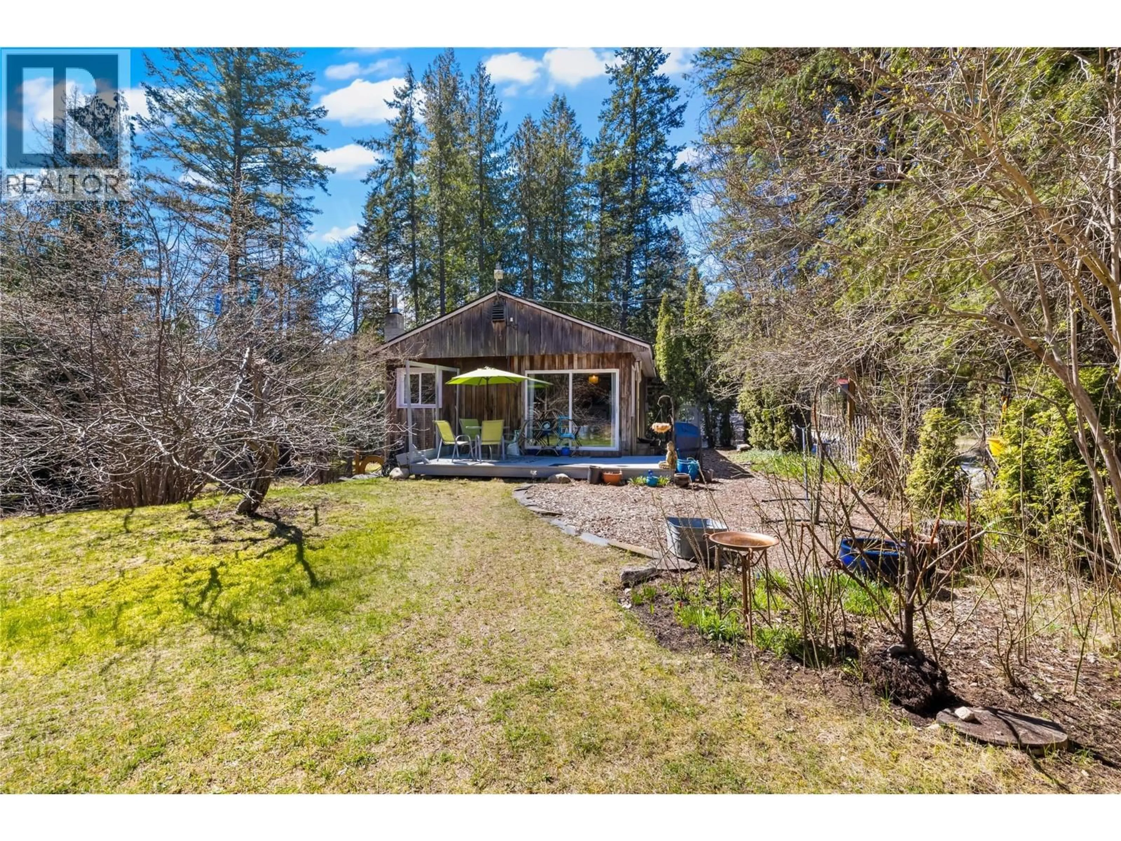 A pic from outside/outdoor area/front of a property/back of a property/a pic from drone, forest/trees view for 16281 3A HIGHWAY, Crawford Bay British Columbia V0B1E0