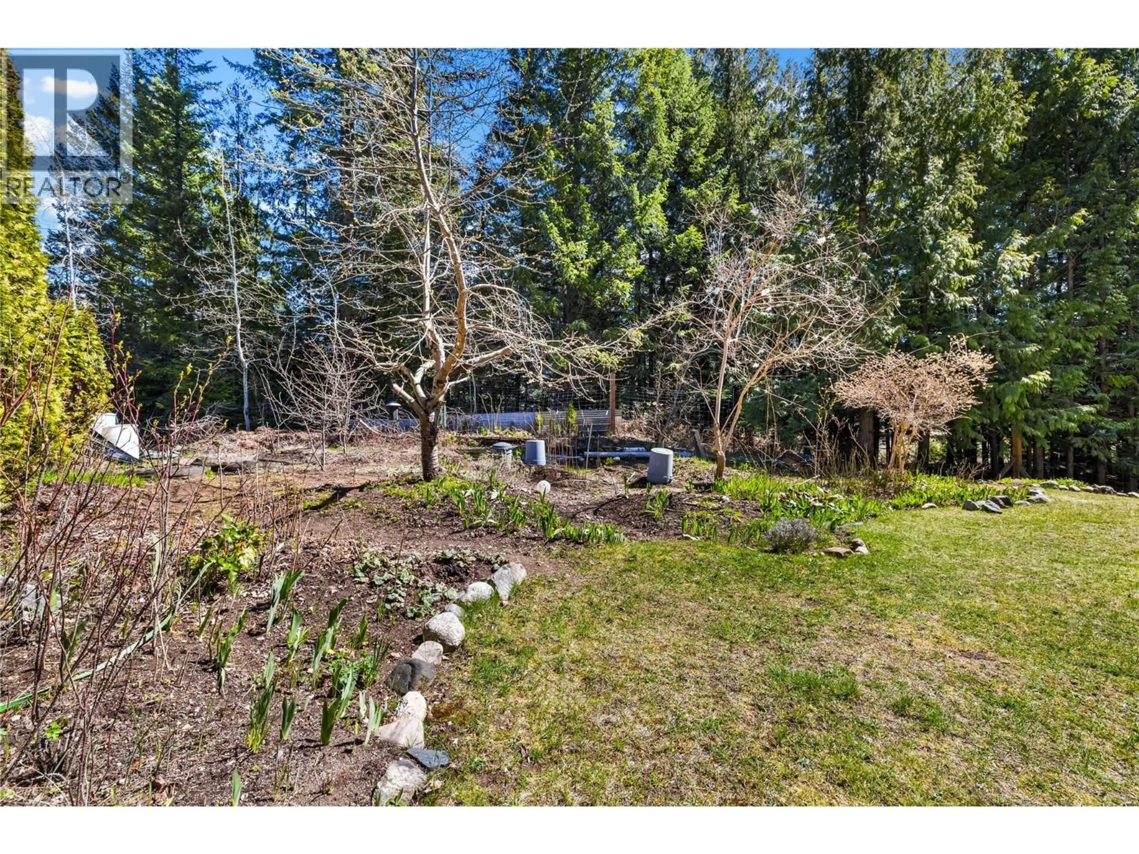 A pic from outside/outdoor area/front of a property/back of a property/a pic from drone, forest/trees view for 16281 3A HIGHWAY, Crawford Bay British Columbia V0B1E0