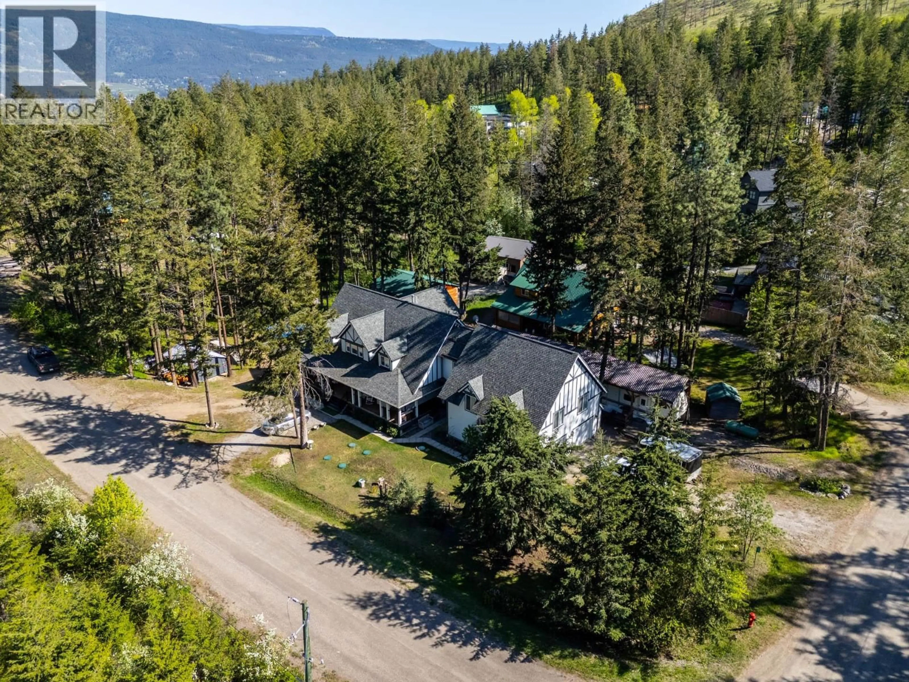 A pic from outside/outdoor area/front of a property/back of a property/a pic from drone, mountain view for 7991 ALPINE ROAD, Kelowna British Columbia V1Z3V8