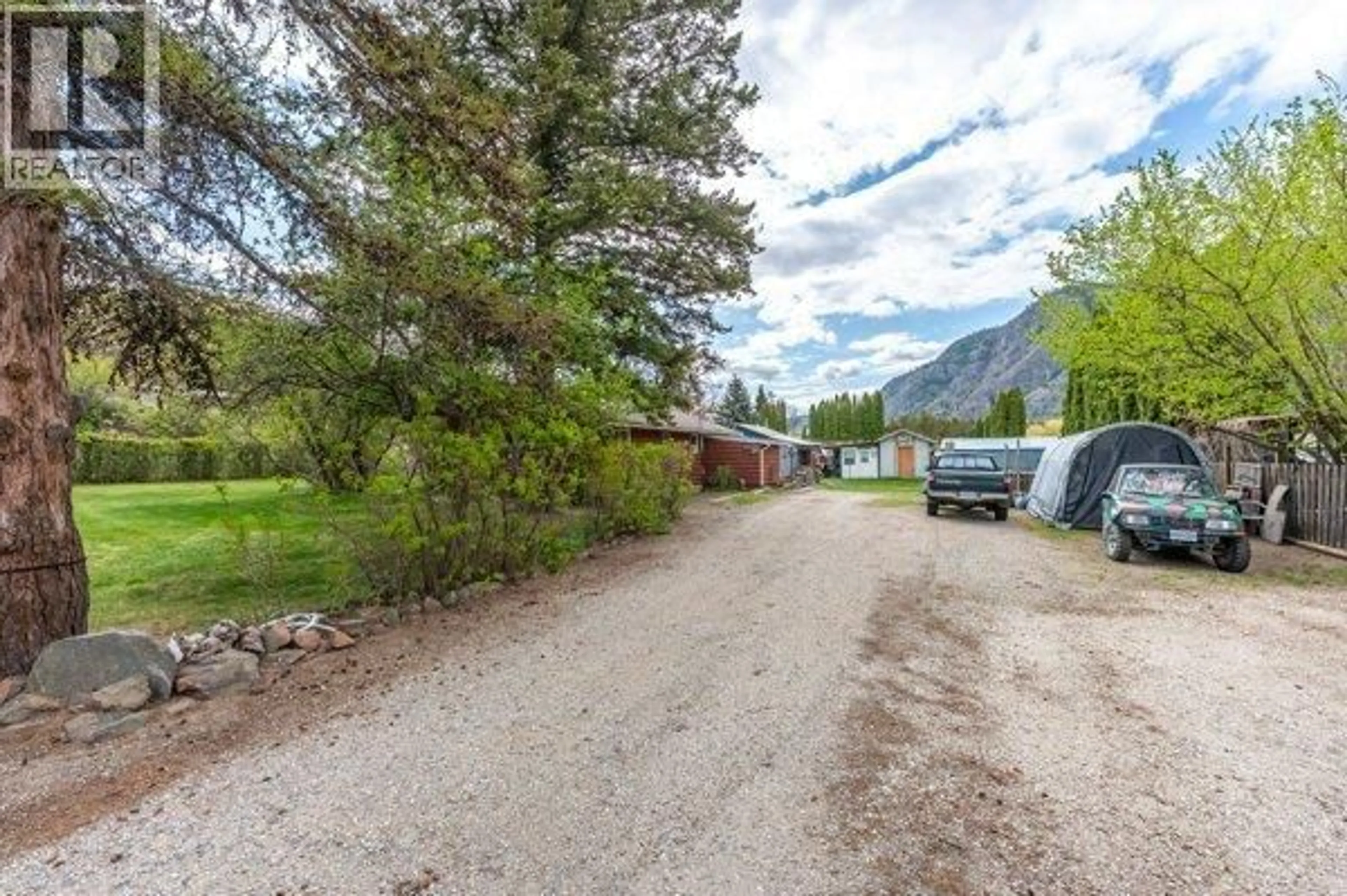 A pic from outside/outdoor area/front of a property/back of a property/a pic from drone, mountain view for 5009 13TH AVENUE, Okanagan Falls British Columbia V0H1R4