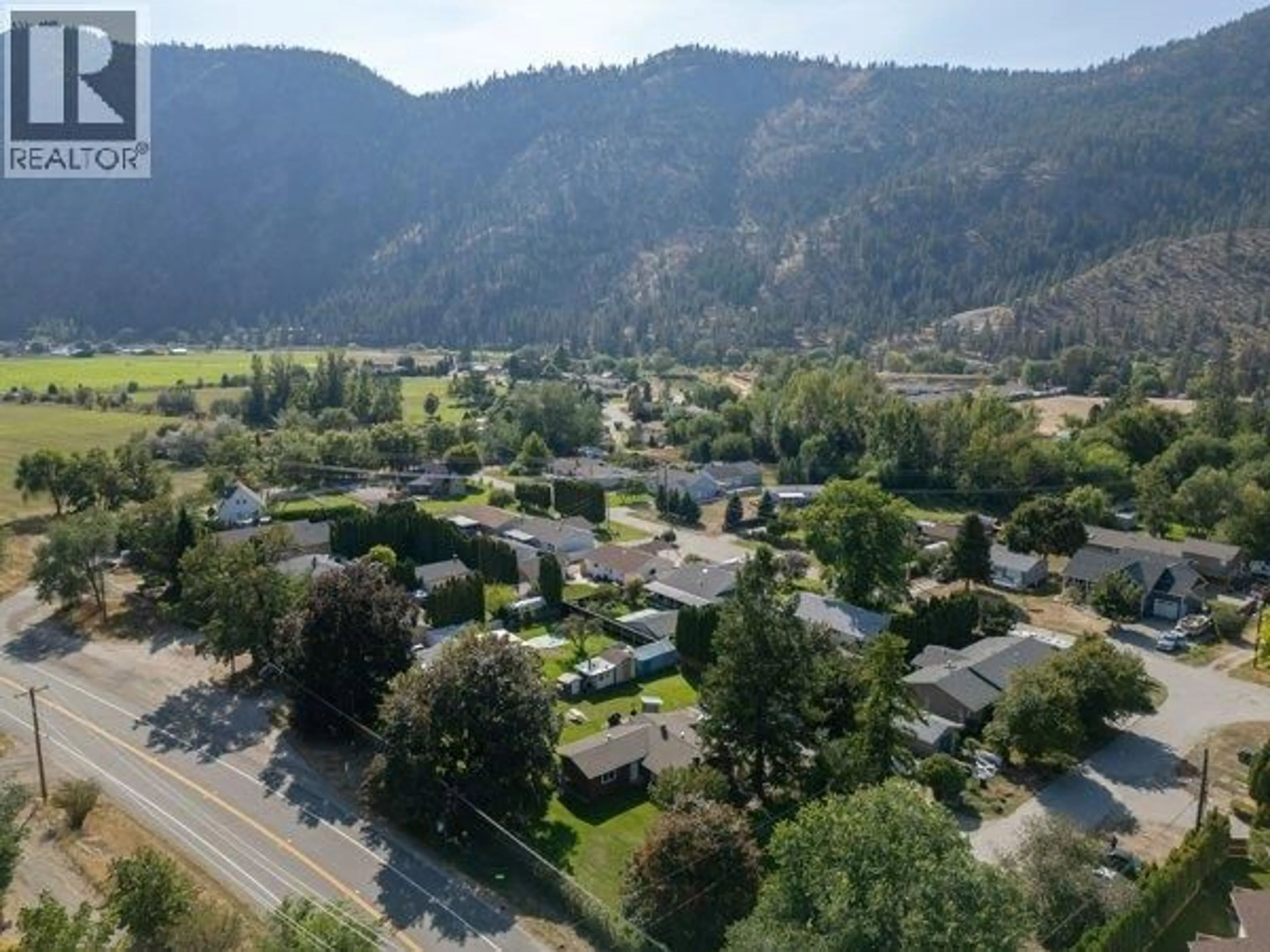 A pic from outside/outdoor area/front of a property/back of a property/a pic from drone, mountain view for 5009 13TH AVENUE, Okanagan Falls British Columbia V0H1R4