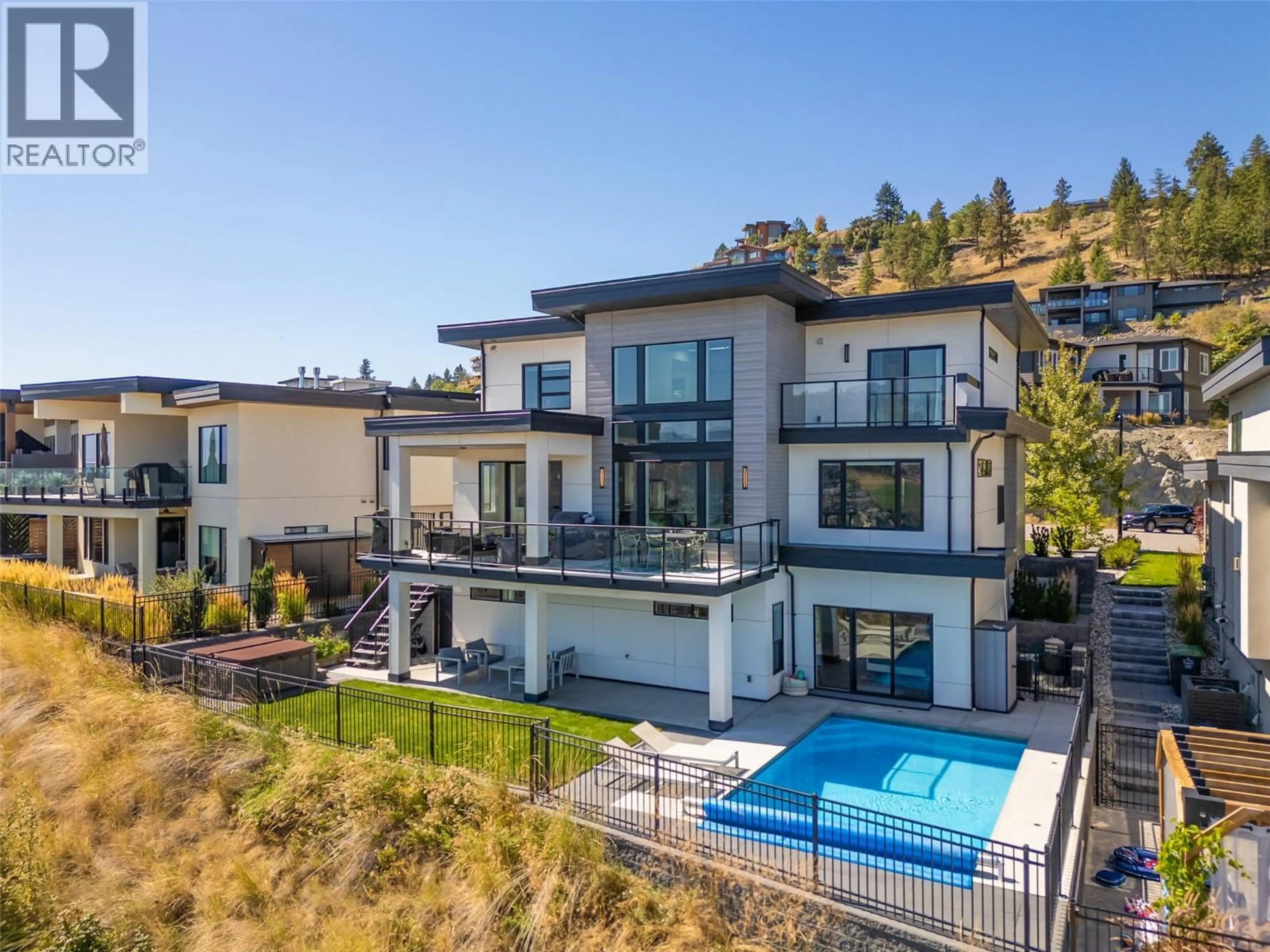 A pic from outside/outdoor area/front of a property/back of a property/a pic from drone, mountain view for 1475 BENZER COURT, Kelowna British Columbia V1V2Y1