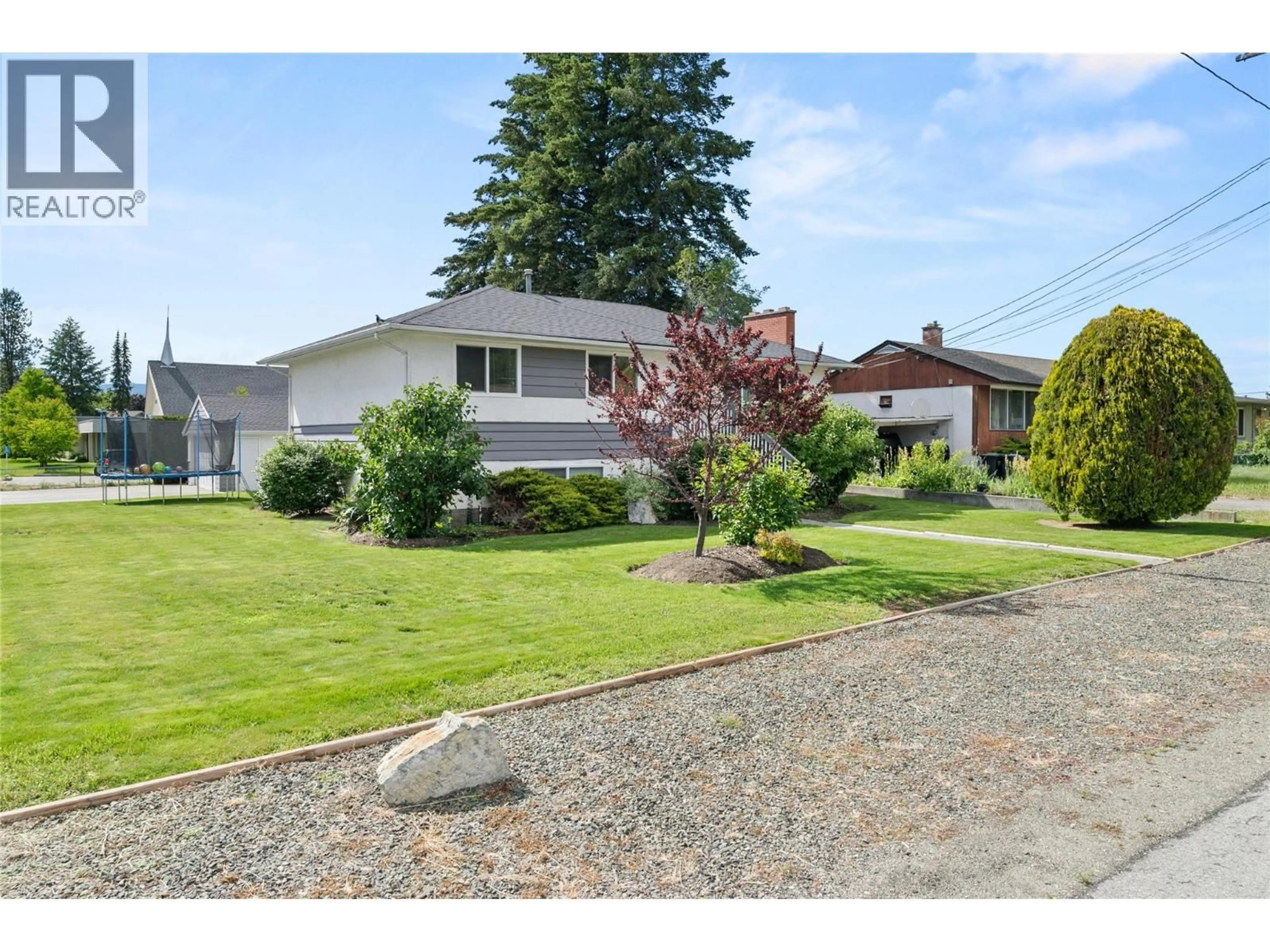 A pic from outside/outdoor area/front of a property/back of a property/a pic from drone, street for 260 GIBBS ROAD, Kelowna British Columbia V1X2W1
