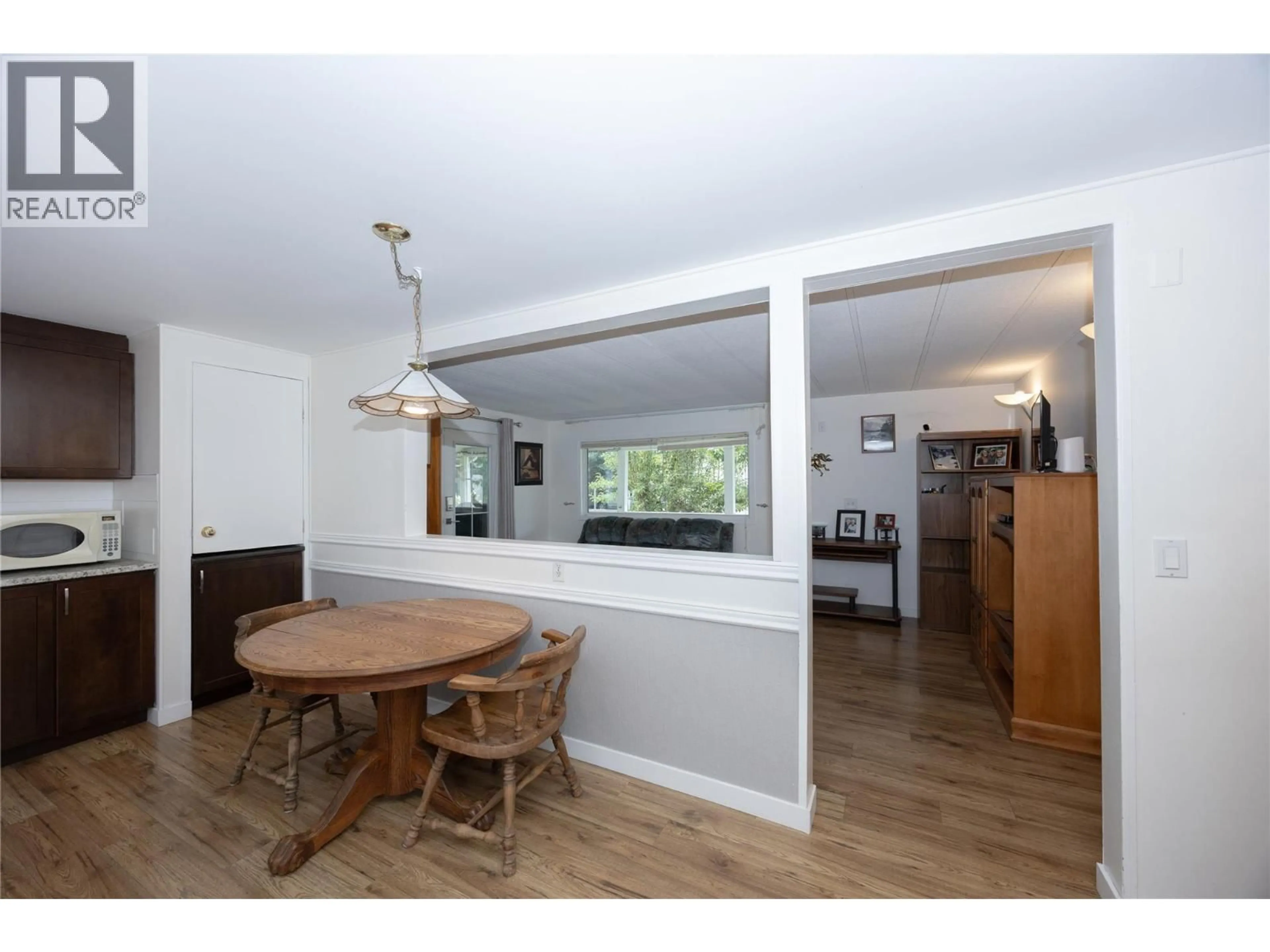 Dining room, wood/laminate floor for 85 - 3535 CASORSO ROAD, Kelowna British Columbia V1W3E1