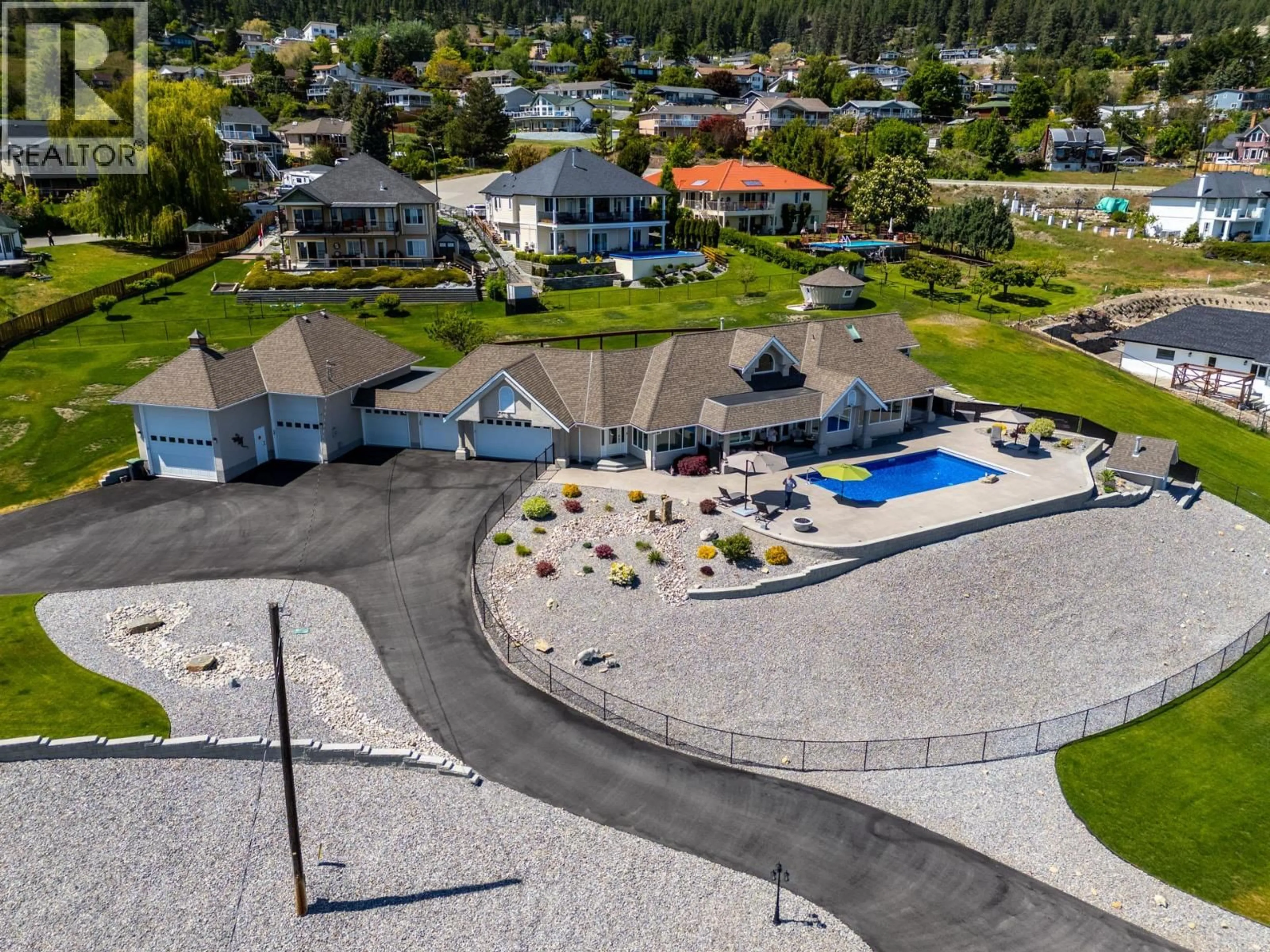 A pic from outside/outdoor area/front of a property/back of a property/a pic from drone, mountain view for 6130 LIPSETT AVENUE, Peachland British Columbia V0H1X7