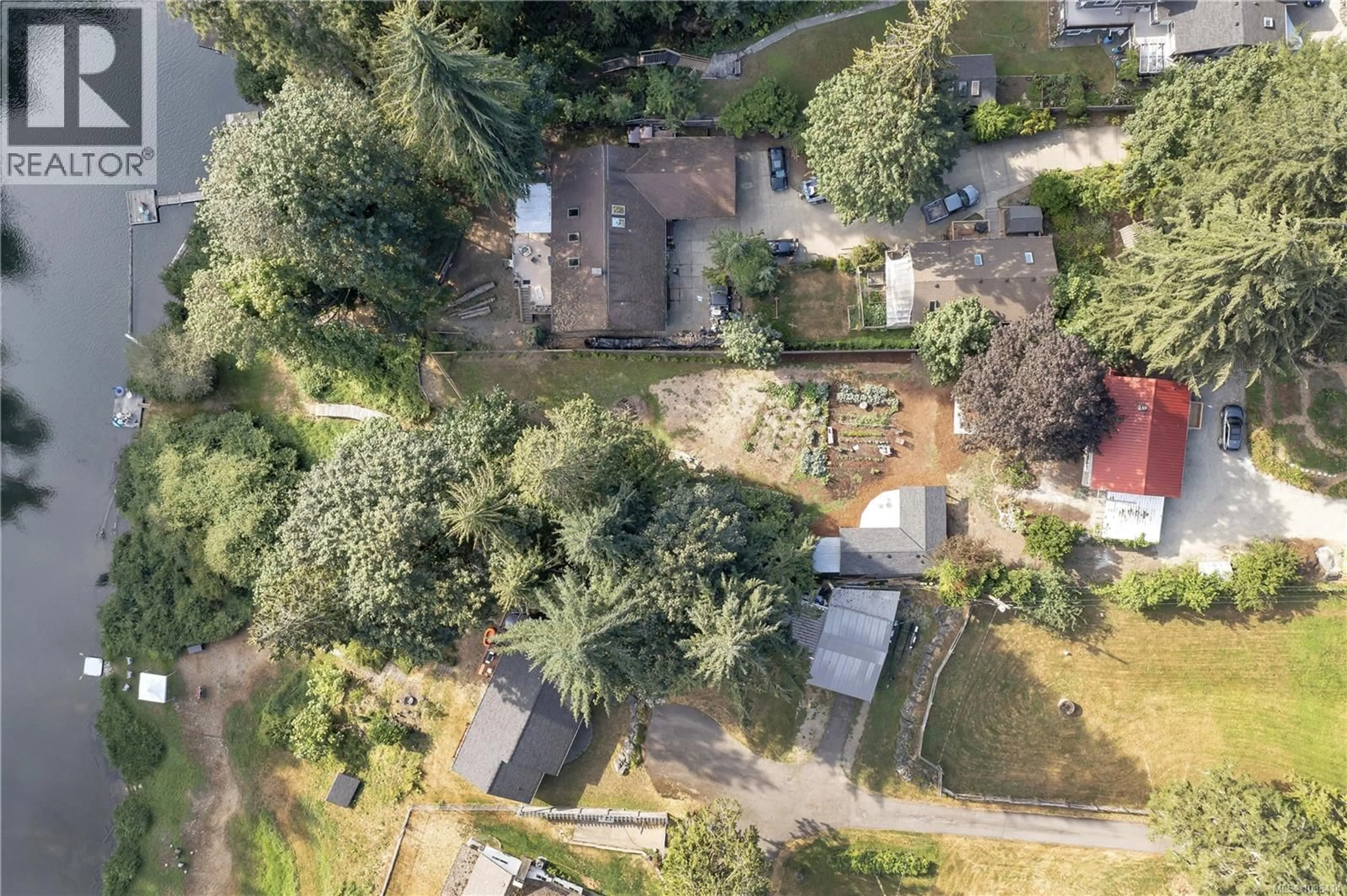 A pic from outside/outdoor area/front of a property/back of a property/a pic from drone, street for 7840 WENTWORTH ROAD, Lake Cowichan British Columbia V0R2G0