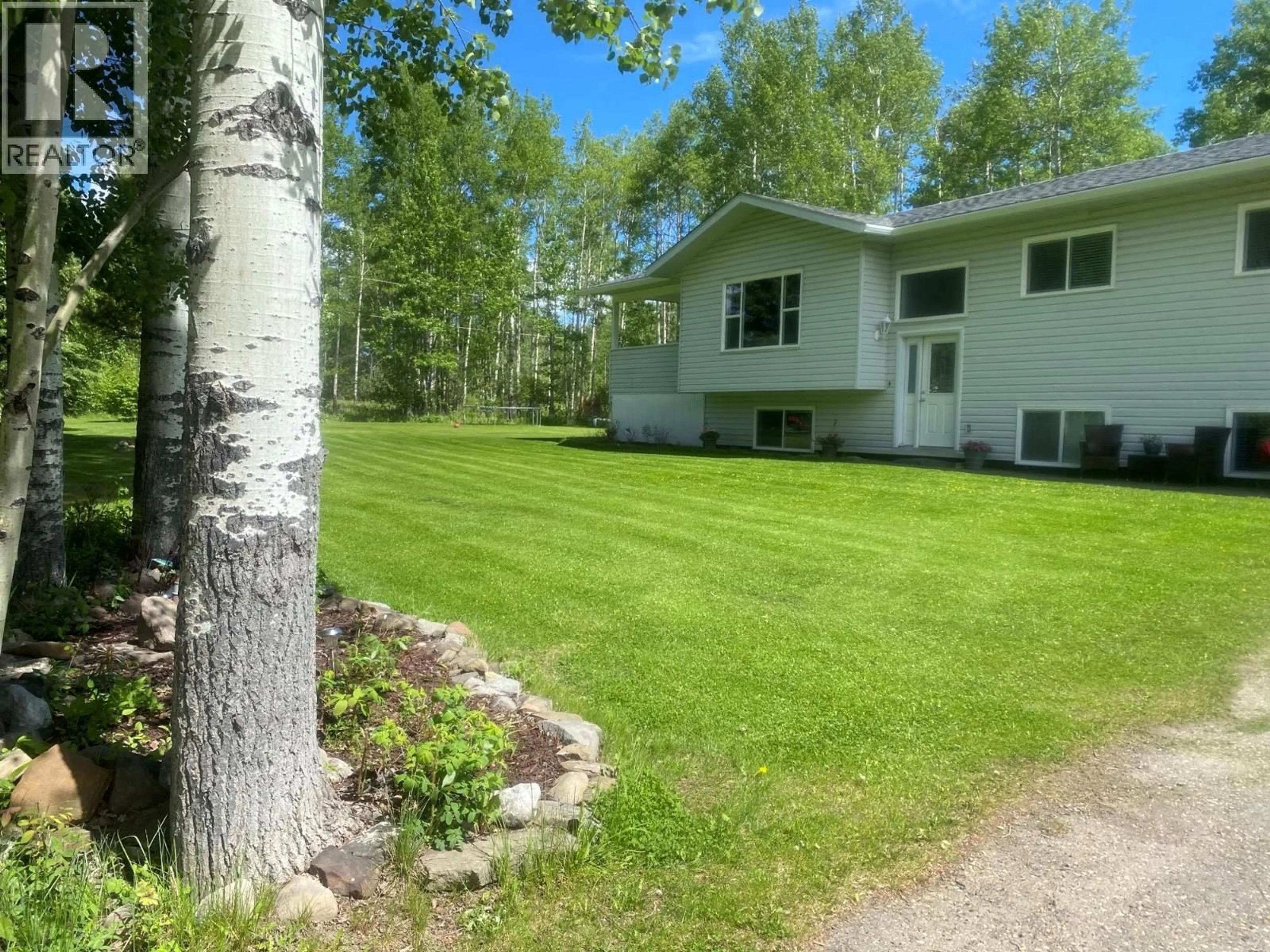 A pic from outside/outdoor area/front of a property/back of a property/a pic from drone, forest/trees view for 5684 WABI OTHER, Chetwynd British Columbia V0C1J0