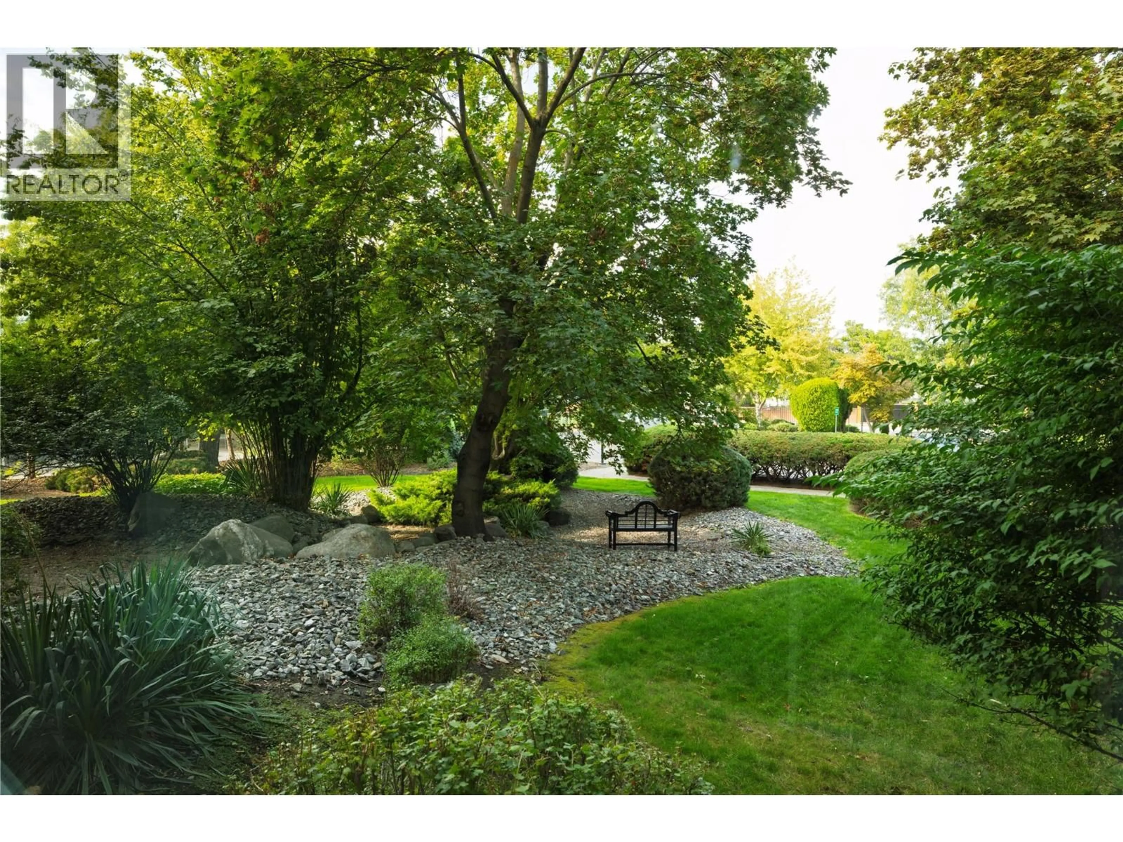 A pic from outside/outdoor area/front of a property/back of a property/a pic from drone, forest/trees view for 115B - 1045 SUTHERLAND AVENUE, Kelowna British Columbia V1Y5Y1
