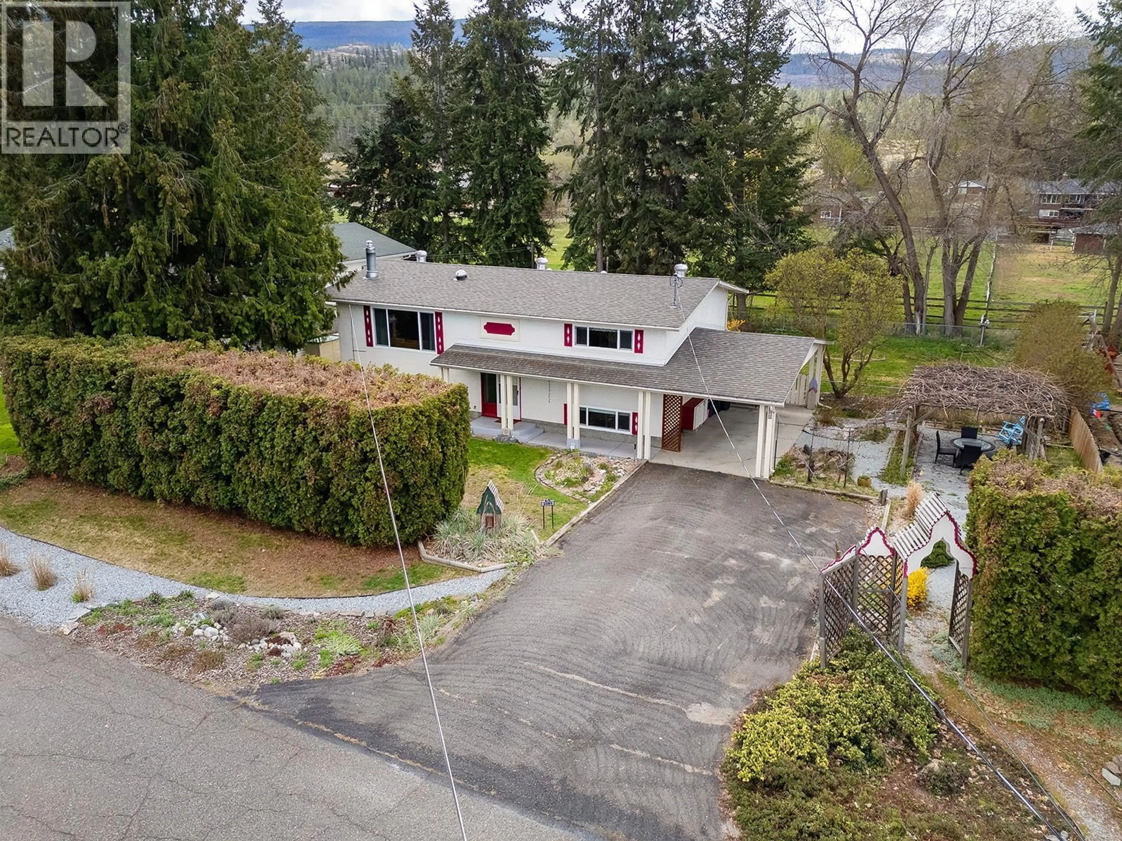 A pic from outside/outdoor area/front of a property/back of a property/a pic from drone, street for 2085 RUBY ROAD, Kelowna British Columbia V1W4B9