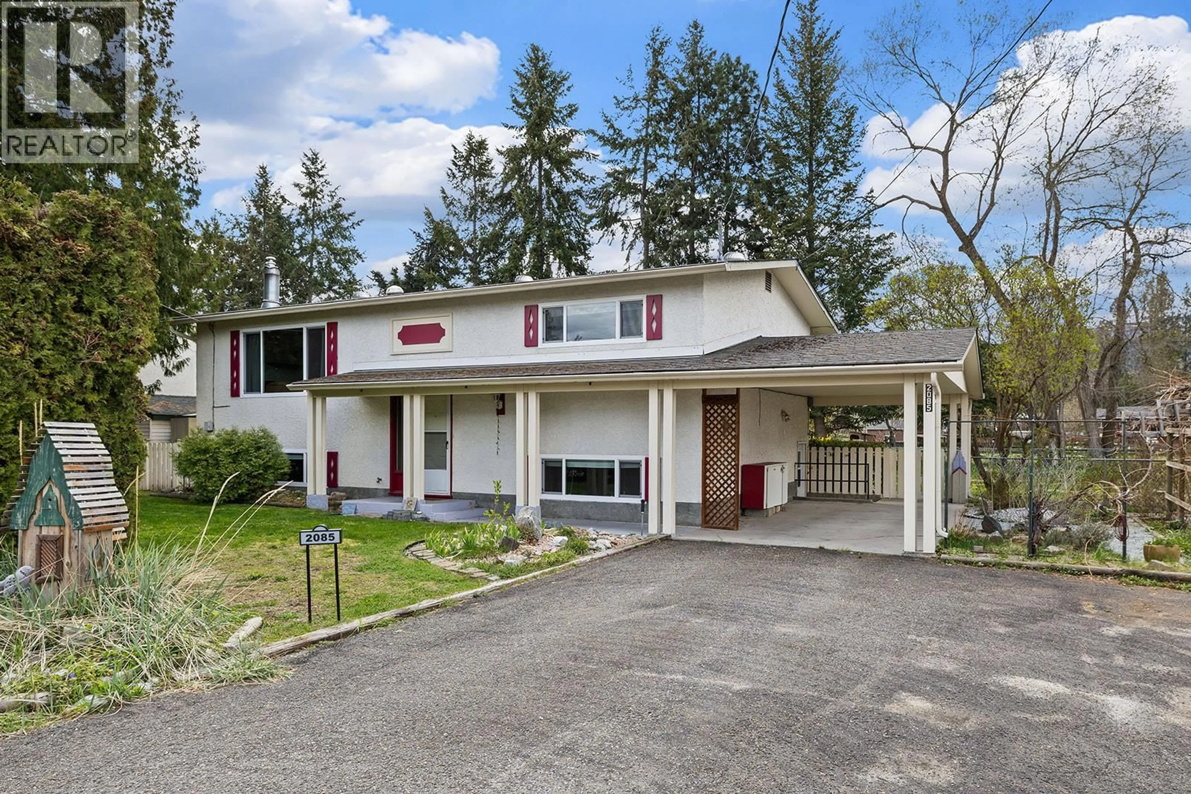 Home with vinyl exterior material, street for 2085 RUBY ROAD, Kelowna British Columbia V1W4B9