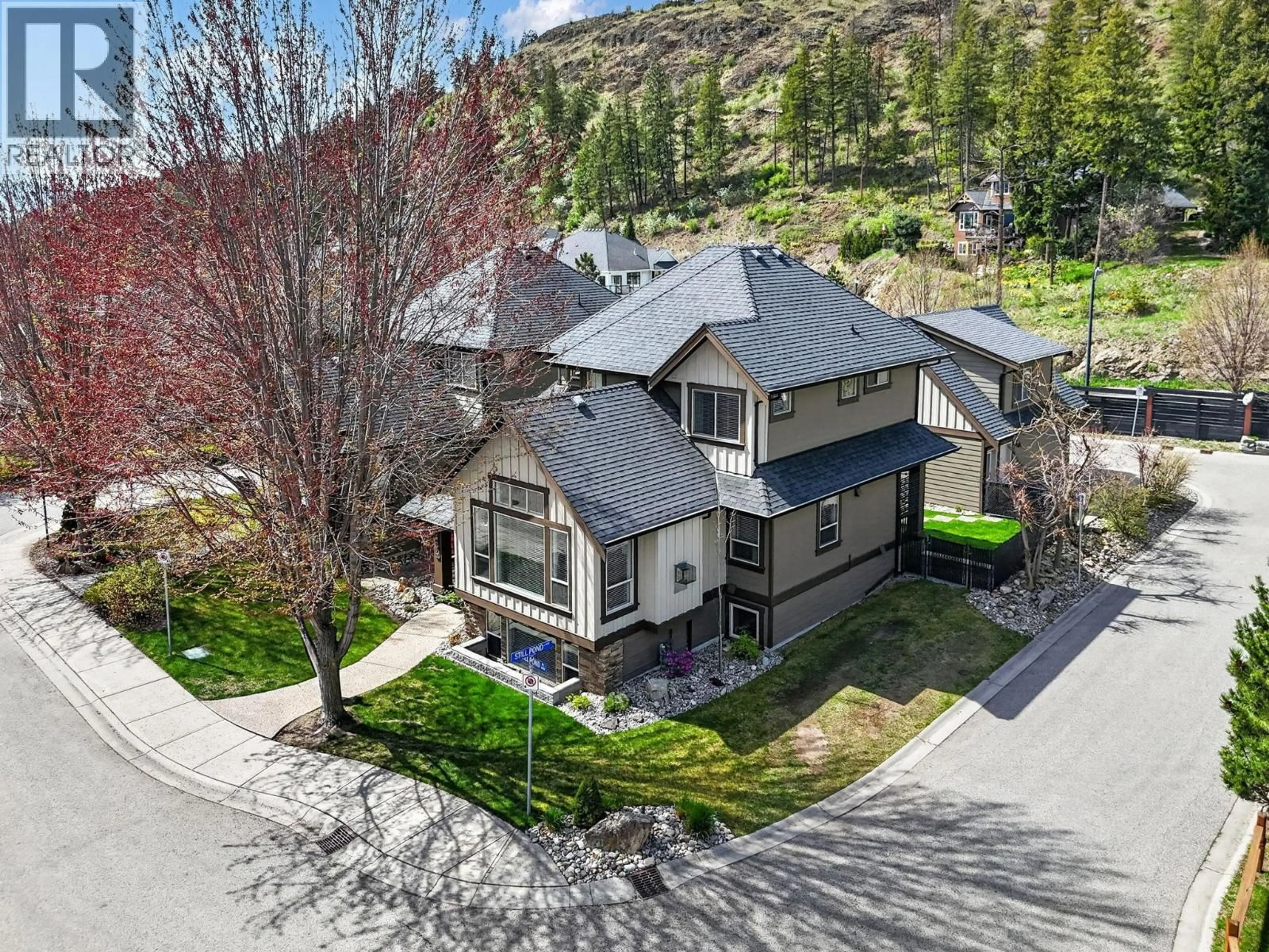A pic from outside/outdoor area/front of a property/back of a property/a pic from drone, mountain view for 434 STILL POND PLACE, Kelowna British Columbia V1V2V4
