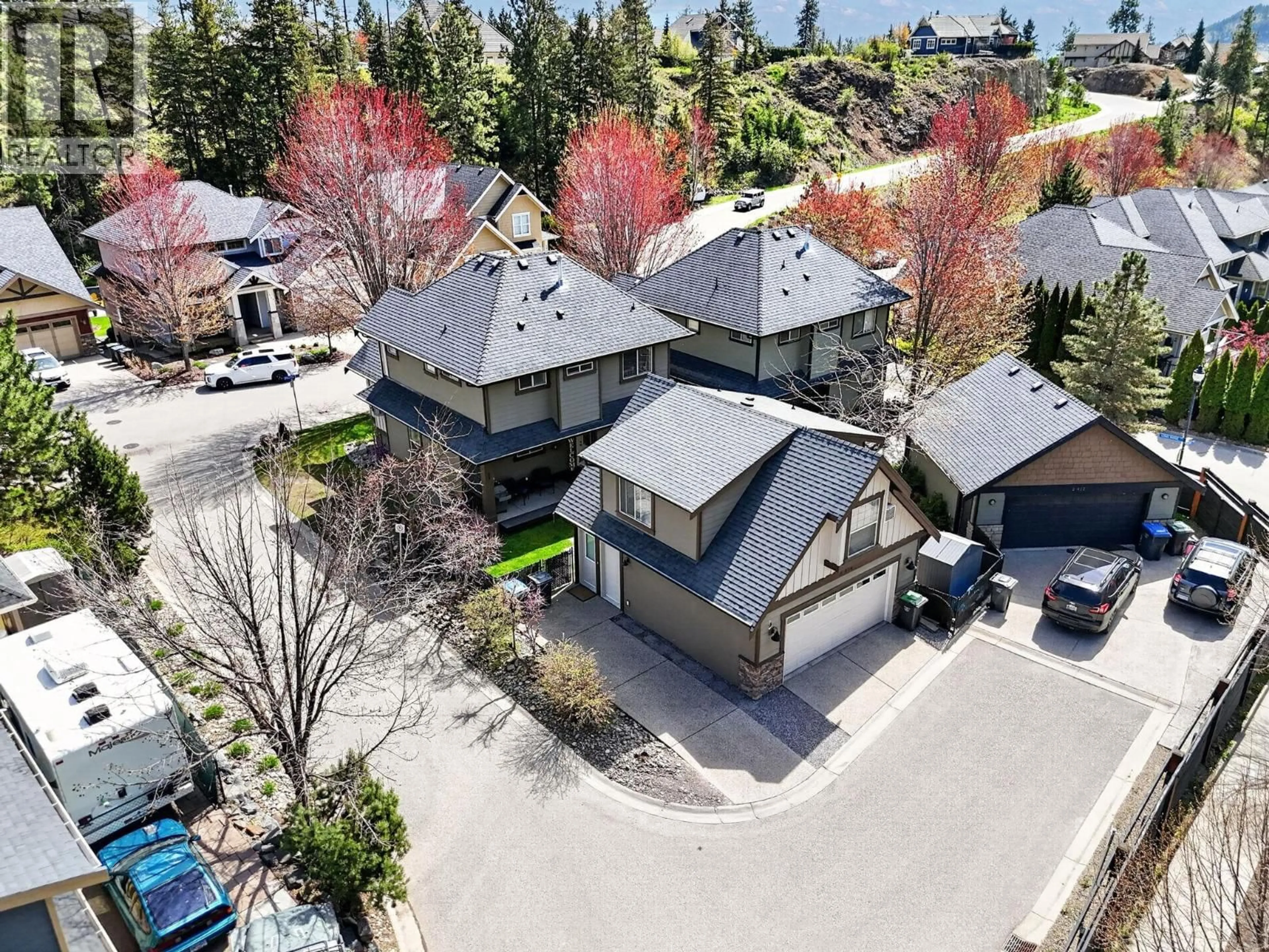 A pic from outside/outdoor area/front of a property/back of a property/a pic from drone, street for 434 STILL POND PLACE, Kelowna British Columbia V1V2V4