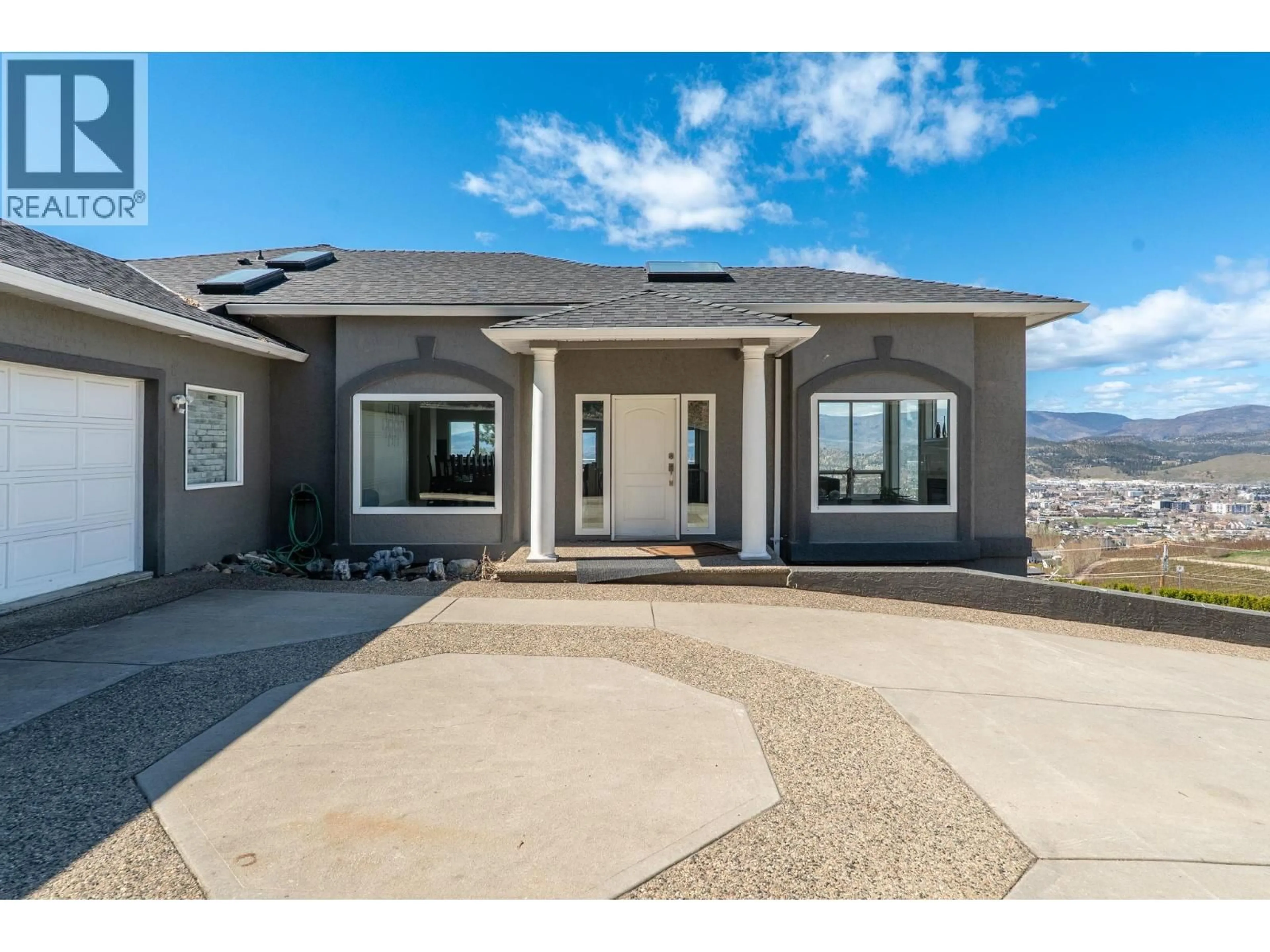 Home with vinyl exterior material, mountain view for 845 TOOVEY ROAD, Kelowna British Columbia V1X6P9