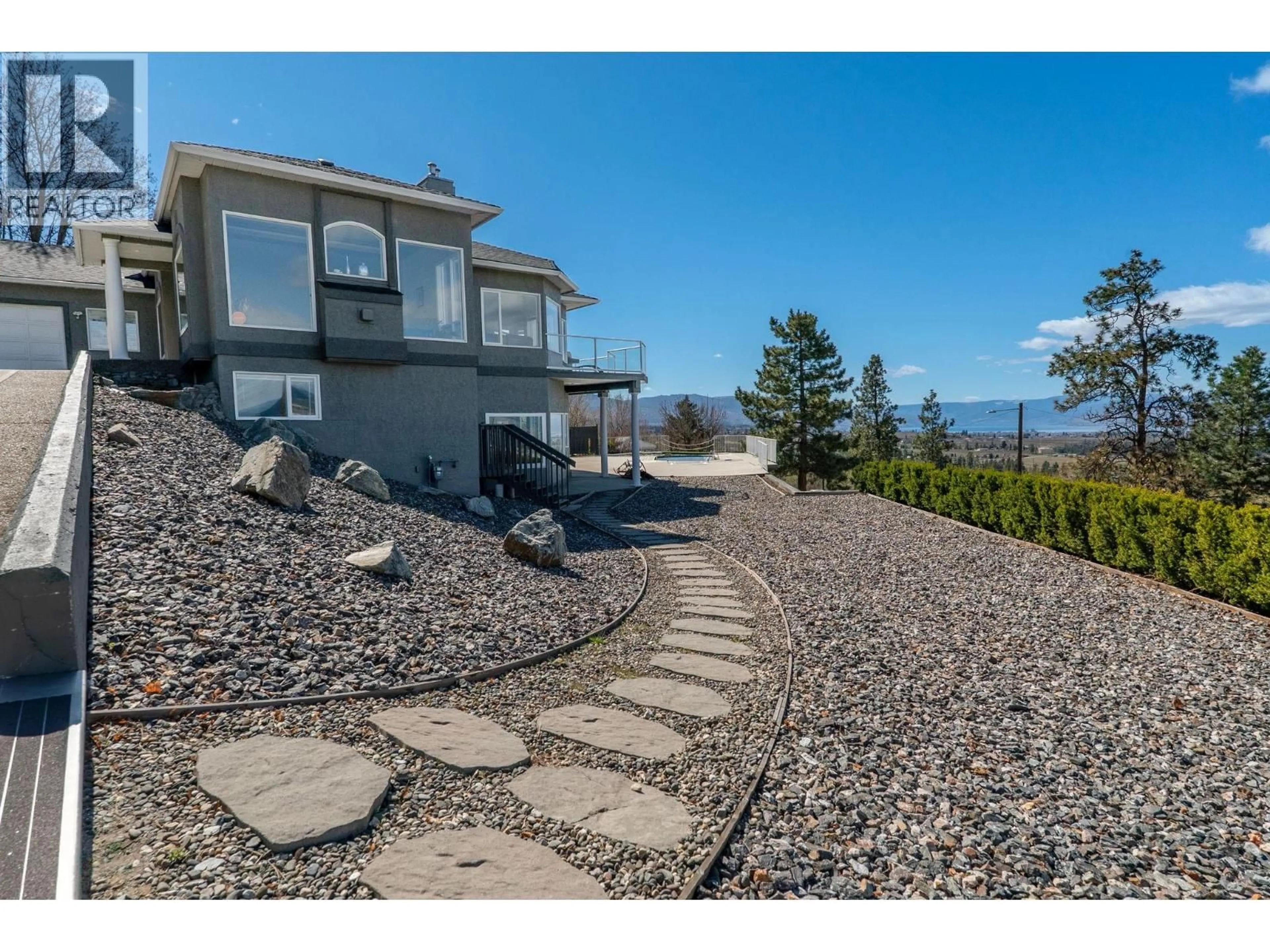 A pic from outside/outdoor area/front of a property/back of a property/a pic from drone, water/lake/river/ocean view for 845 TOOVEY ROAD, Kelowna British Columbia V1X6P9
