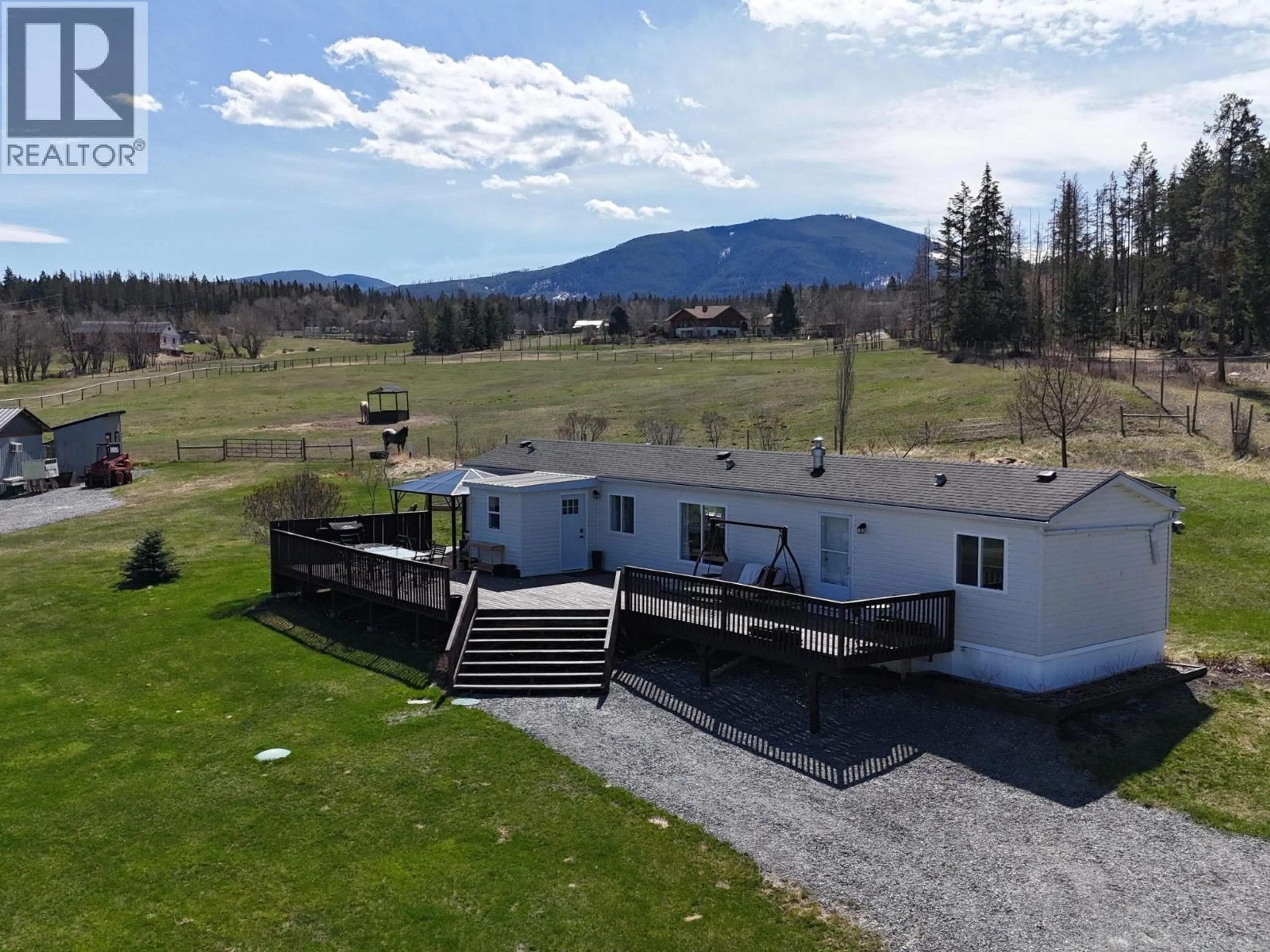 A pic from outside/outdoor area/front of a property/back of a property/a pic from drone, mountain view for 3251 45TH STREET SOUTH, Cranbrook British Columbia V1C7A1