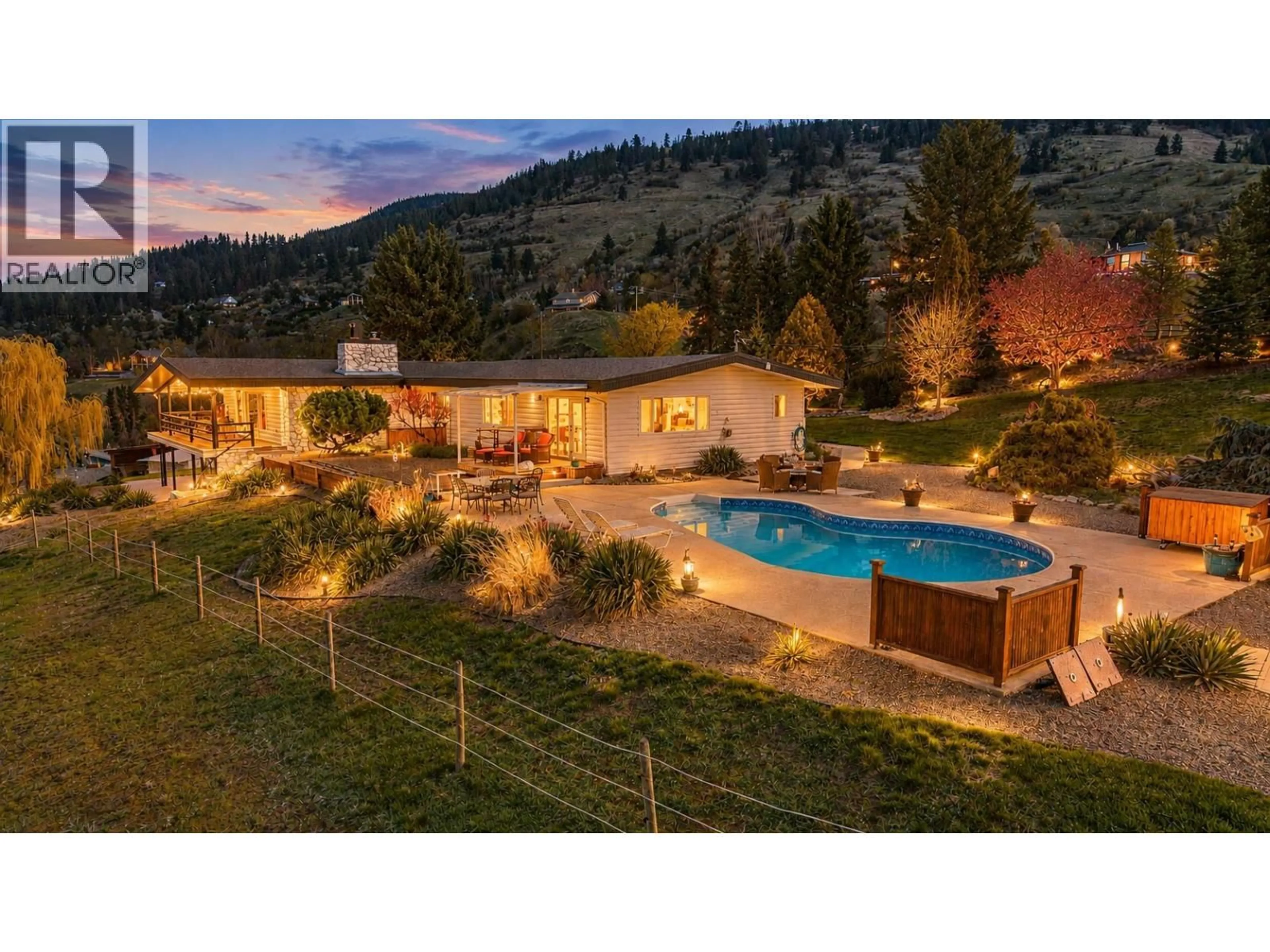 A pic from outside/outdoor area/front of a property/back of a property/a pic from drone, mountain view for 701 ROBIN ROAD, Vernon British Columbia V1B3B3