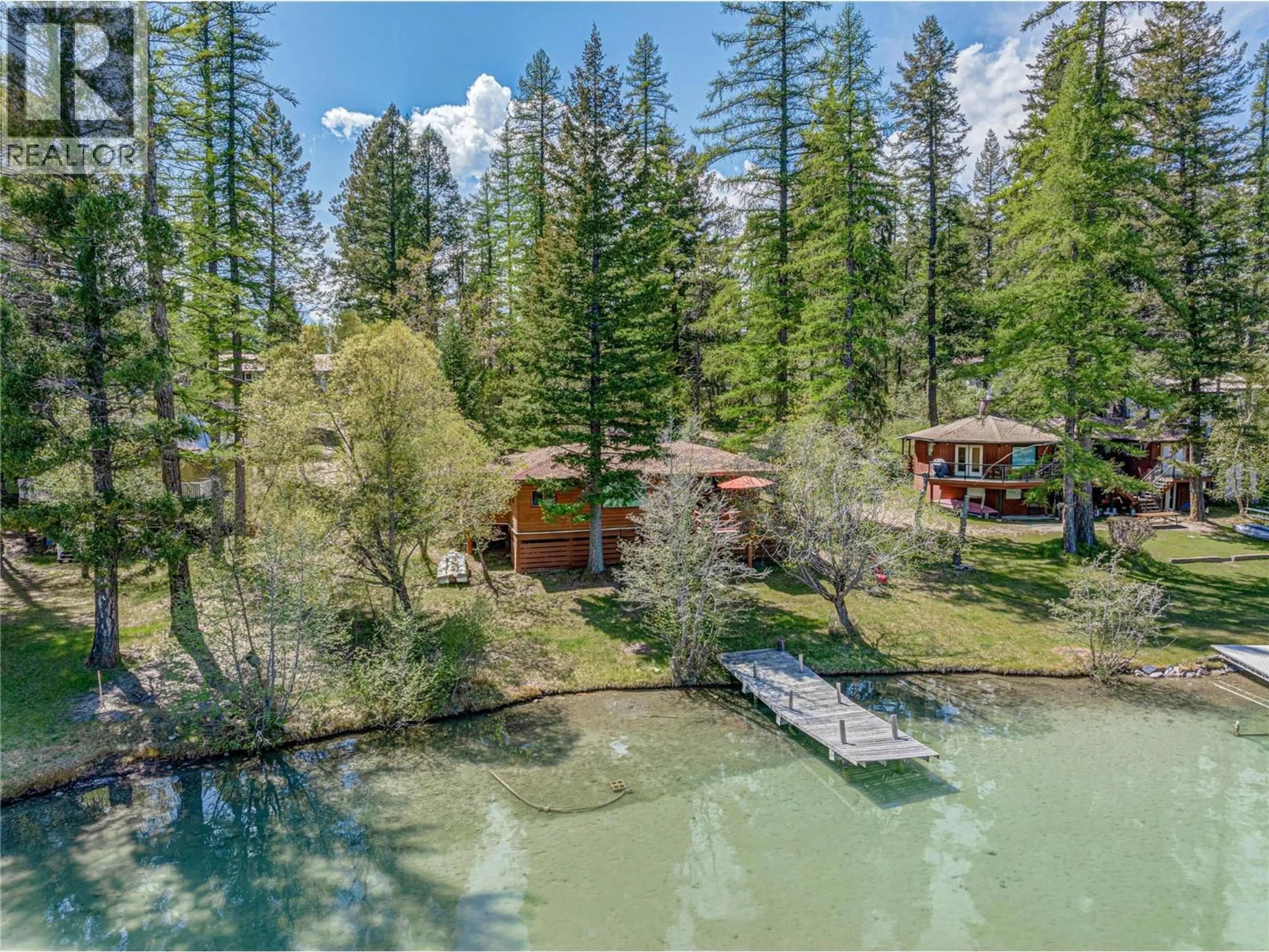 A pic from outside/outdoor area/front of a property/back of a property/a pic from drone, water/lake/river/ocean view for 6832 LEGION ROAD, Jaffray British Columbia V0B1T0