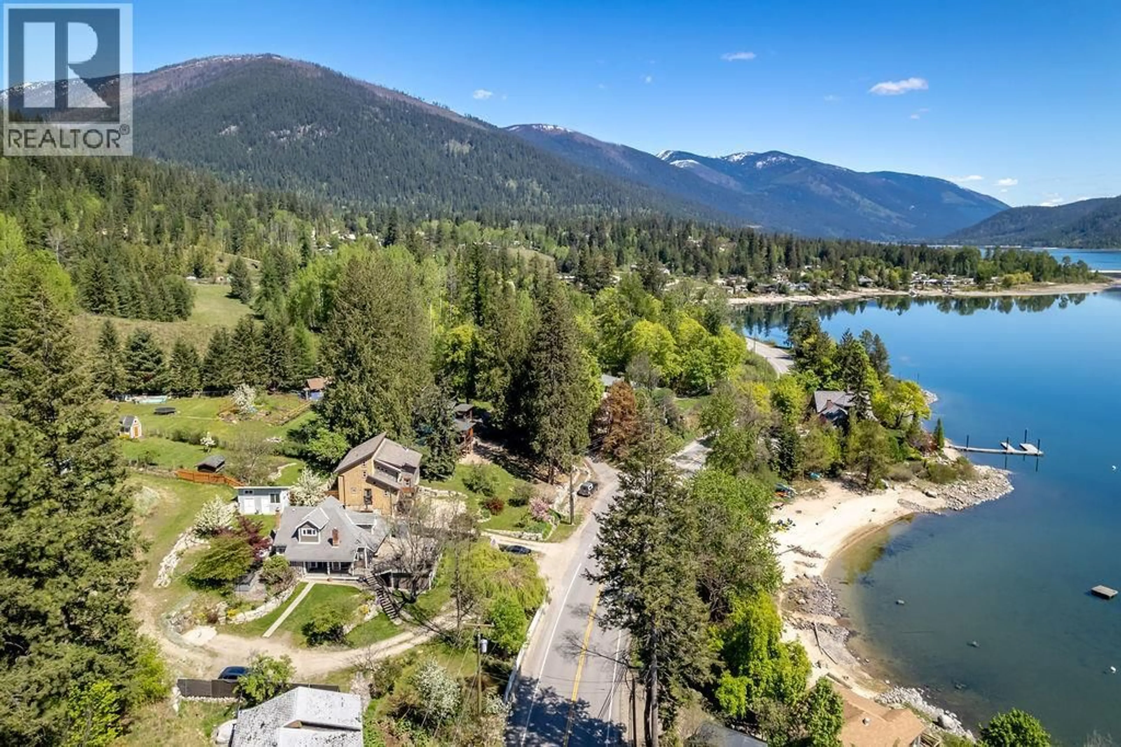 A pic from outside/outdoor area/front of a property/back of a property/a pic from drone, water/lake/river/ocean view for 2465 3A HIGHWAY, Nelson British Columbia V1L6K7
