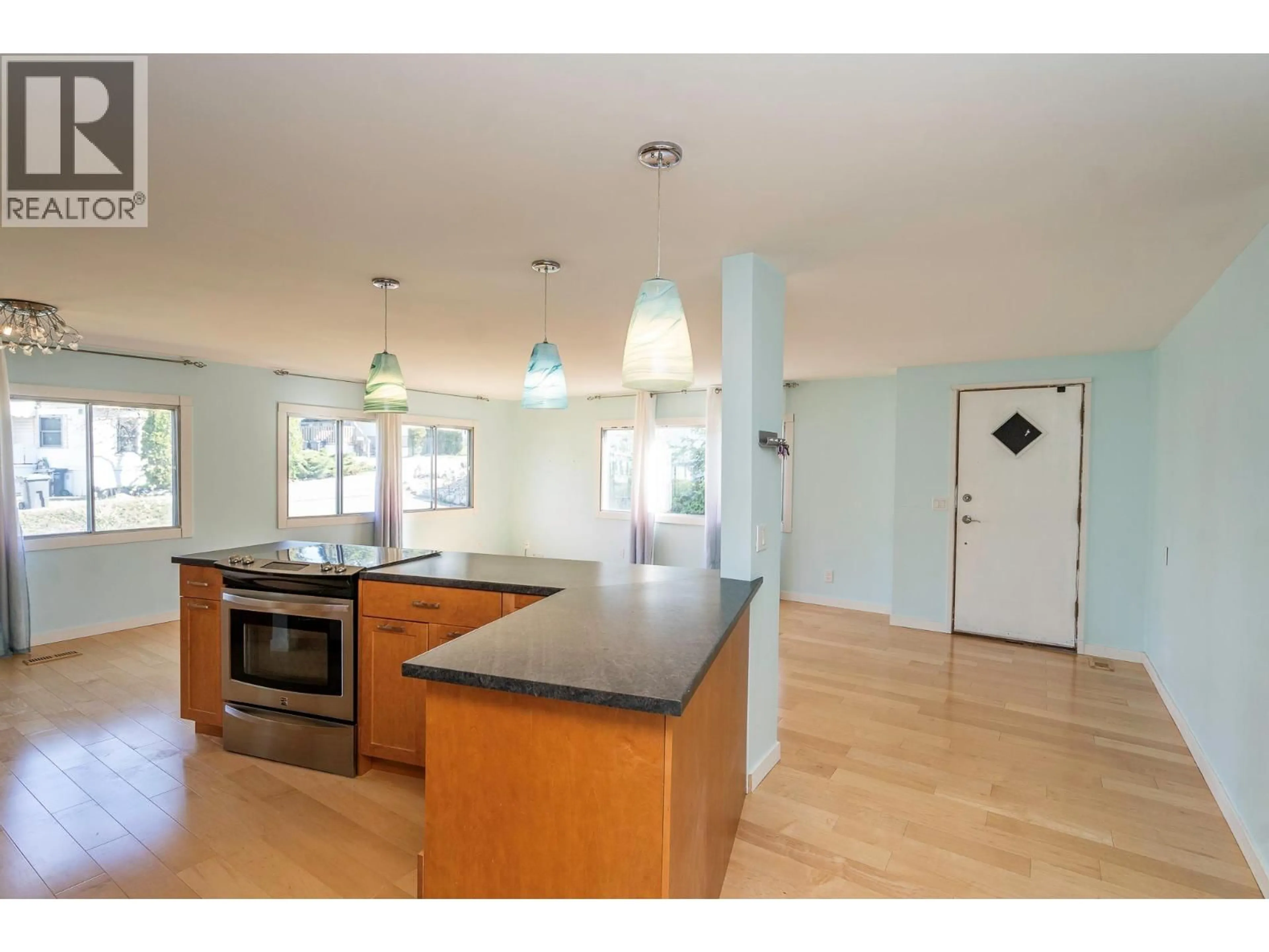 Open concept kitchen, wood/laminate floor for 19 - 3535 MCCULLOCH ROAD, Kelowna British Columbia V1W4R8