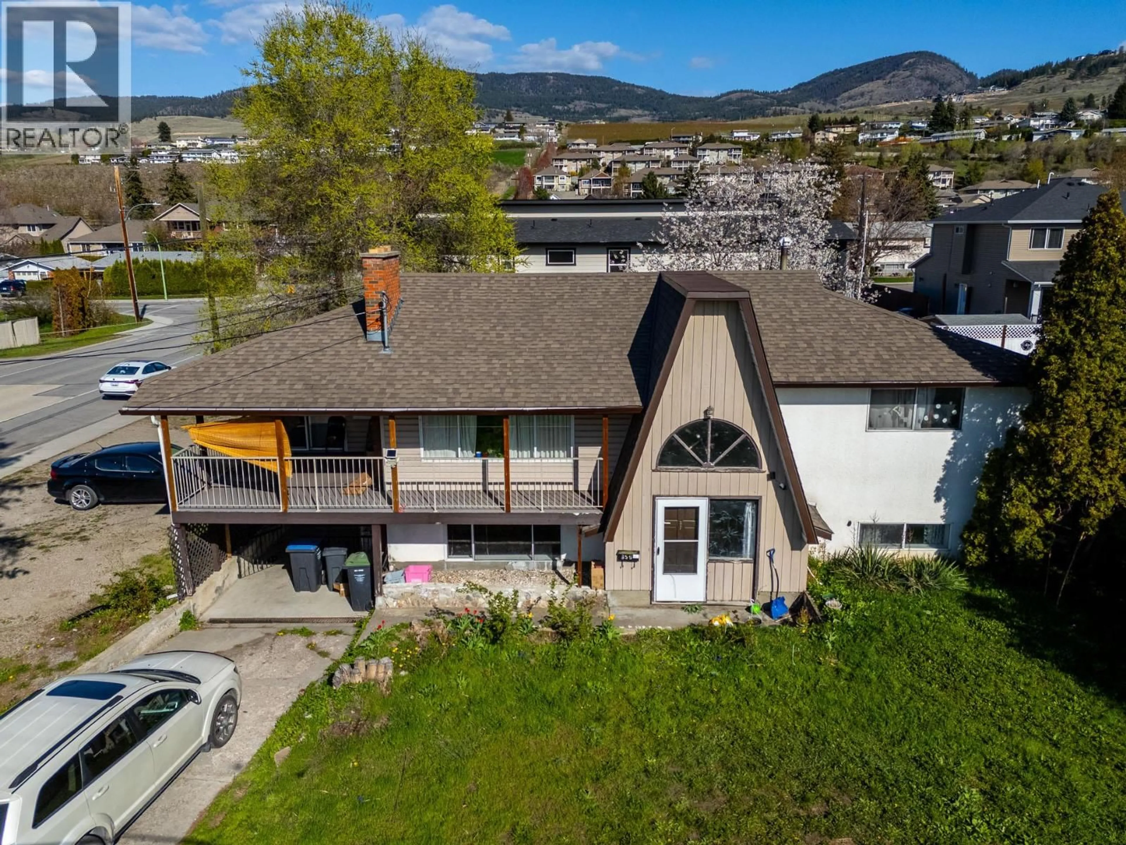 A pic from outside/outdoor area/front of a property/back of a property/a pic from drone, mountain view for 355 MARA ROAD, Kelowna British Columbia V1X2T1