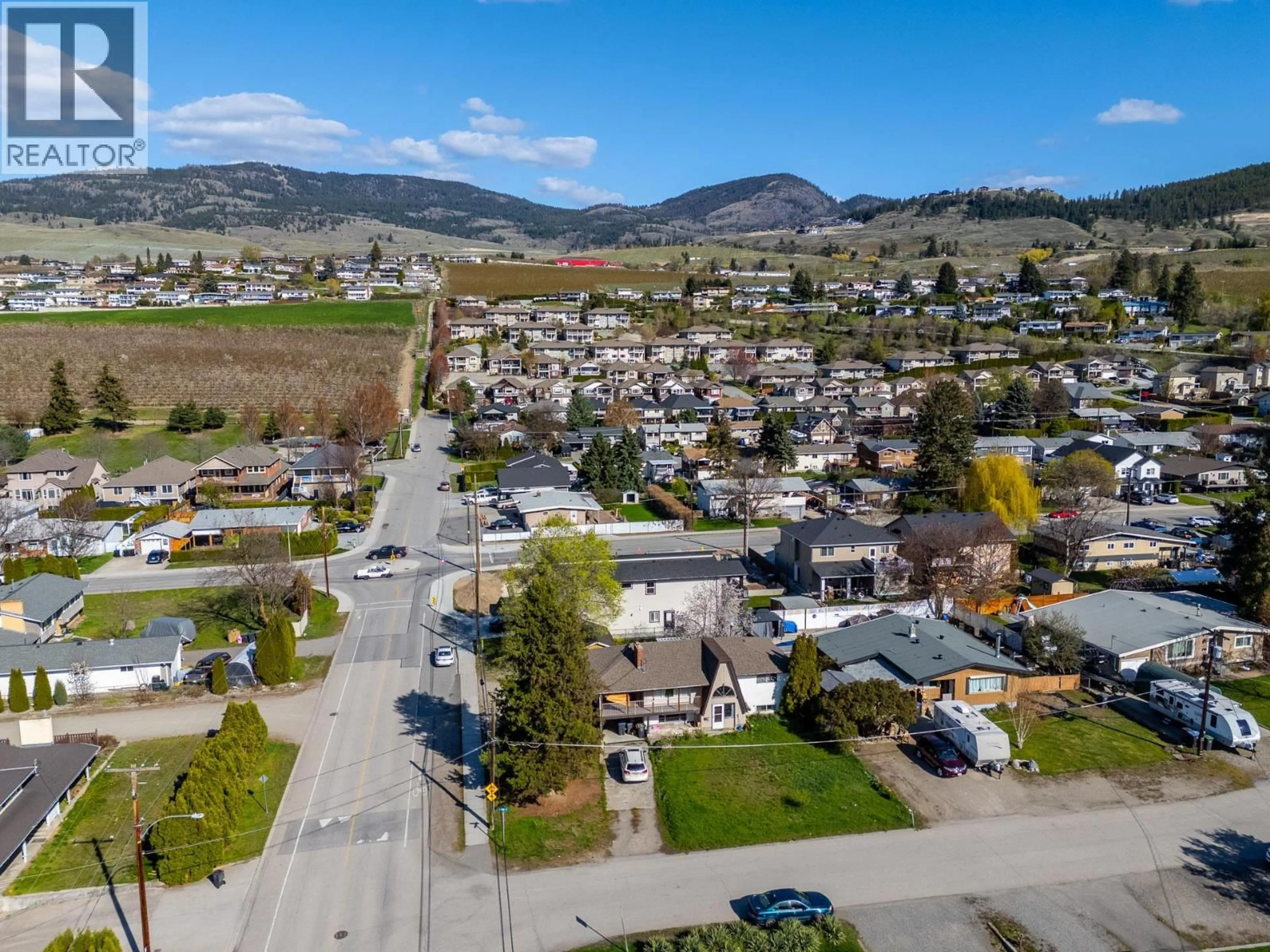 A pic from outside/outdoor area/front of a property/back of a property/a pic from drone, mountain view for 355 MARA ROAD, Kelowna British Columbia V1X2T1