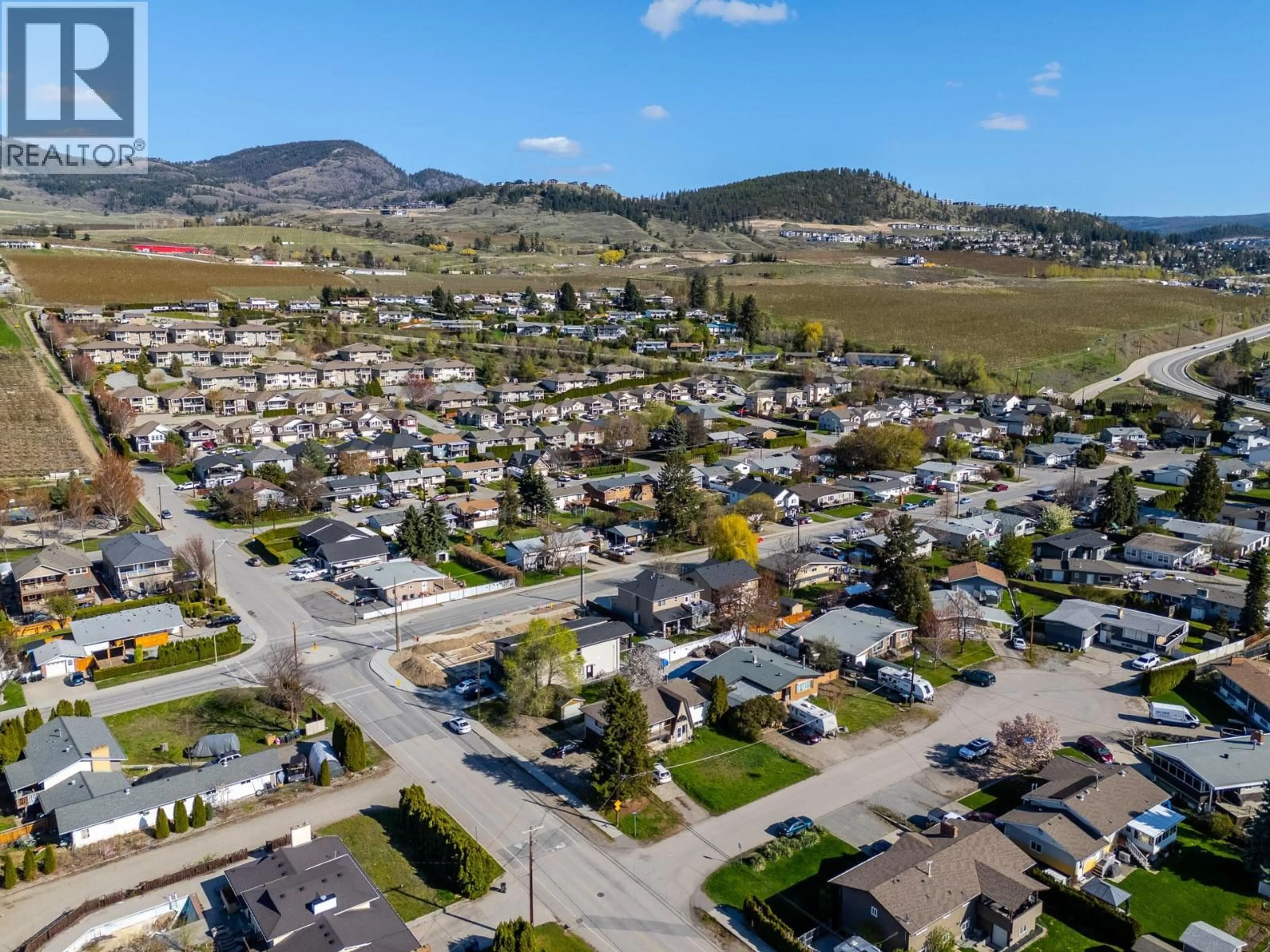 A pic from outside/outdoor area/front of a property/back of a property/a pic from drone, mountain view for 355 MARA ROAD, Kelowna British Columbia V1X2T1