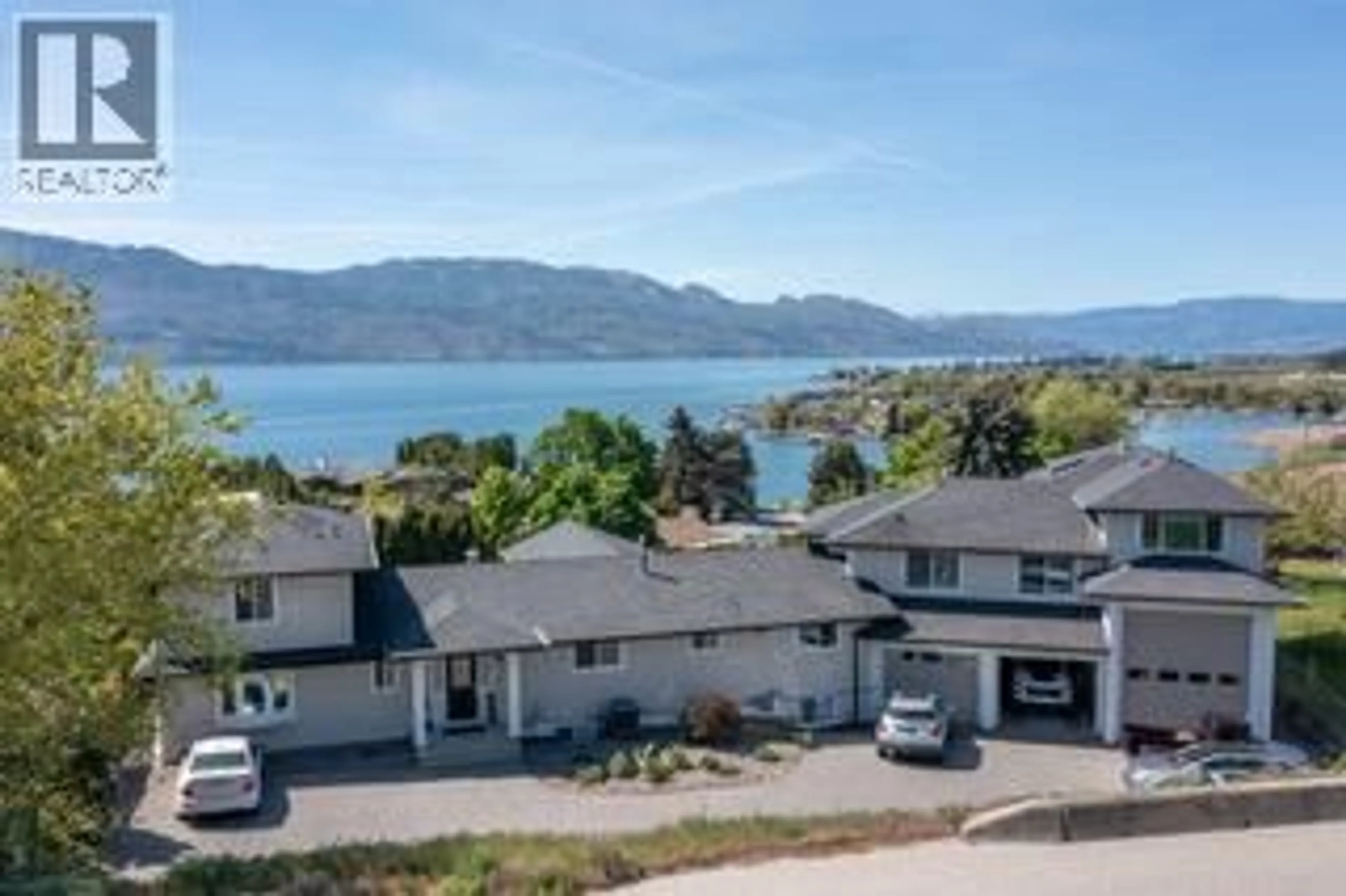 A pic from outside/outdoor area/front of a property/back of a property/a pic from drone, water/lake/river/ocean view for 1185 SUNNYSIDE ROAD, West Kelowna British Columbia V1Z2S5