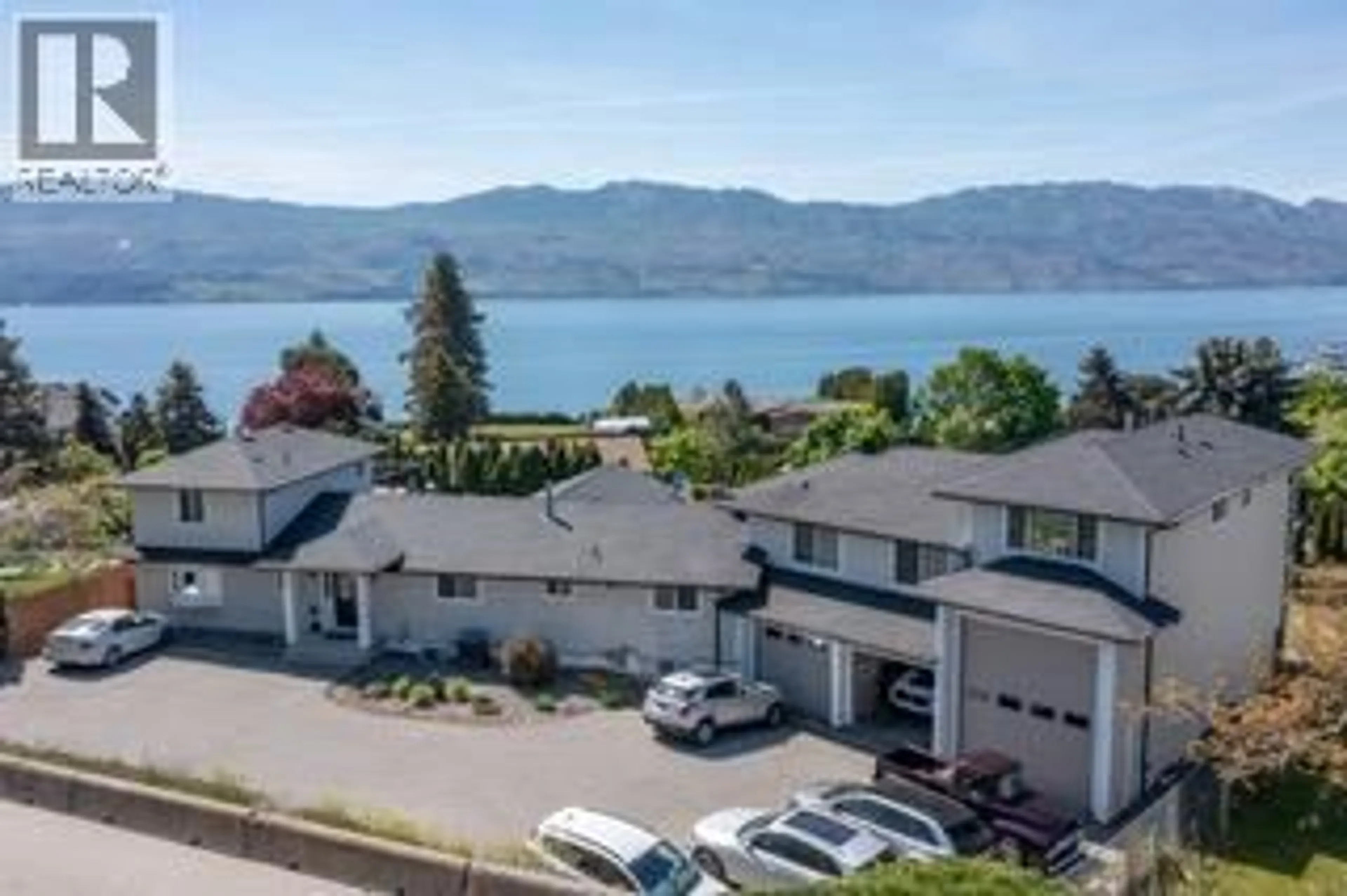 A pic from outside/outdoor area/front of a property/back of a property/a pic from drone, water/lake/river/ocean view for 1185 SUNNYSIDE ROAD, West Kelowna British Columbia V1Z2S5