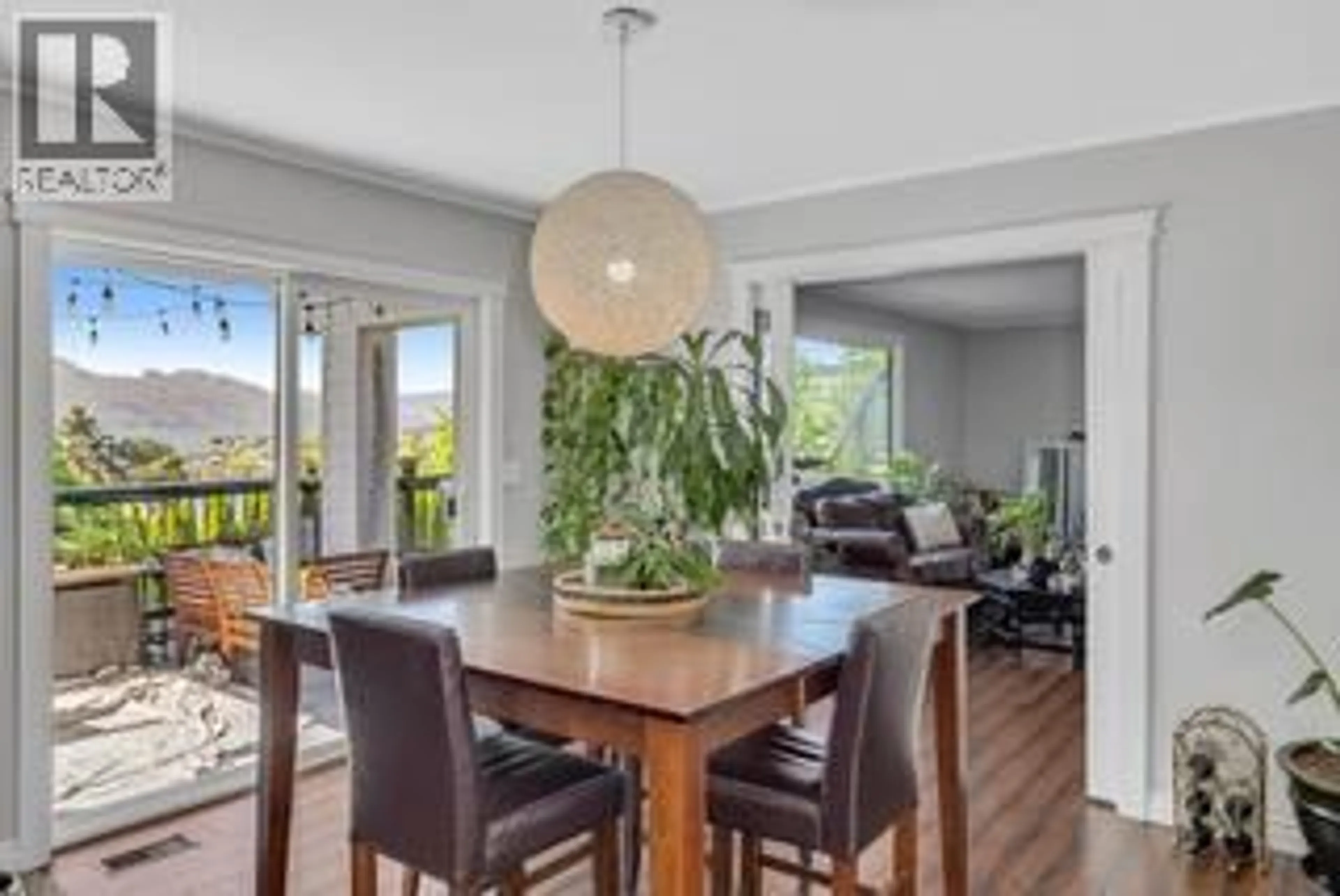Dining room, wood/laminate floor for 1185 SUNNYSIDE ROAD, West Kelowna British Columbia V1Z2S5
