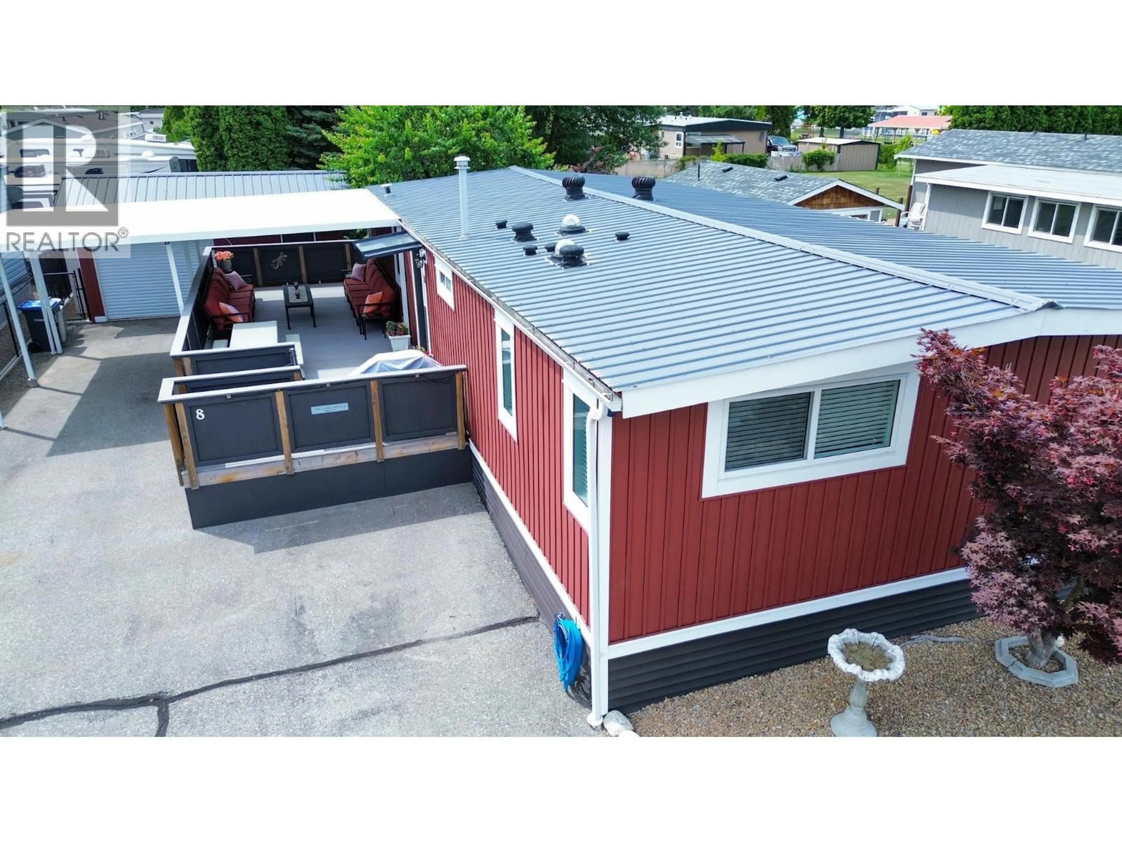 A pic from outside/outdoor area/front of a property/back of a property/a pic from drone, street for 8 - 4911 CEDAR LANE, Osoyoos British Columbia V0H1V3