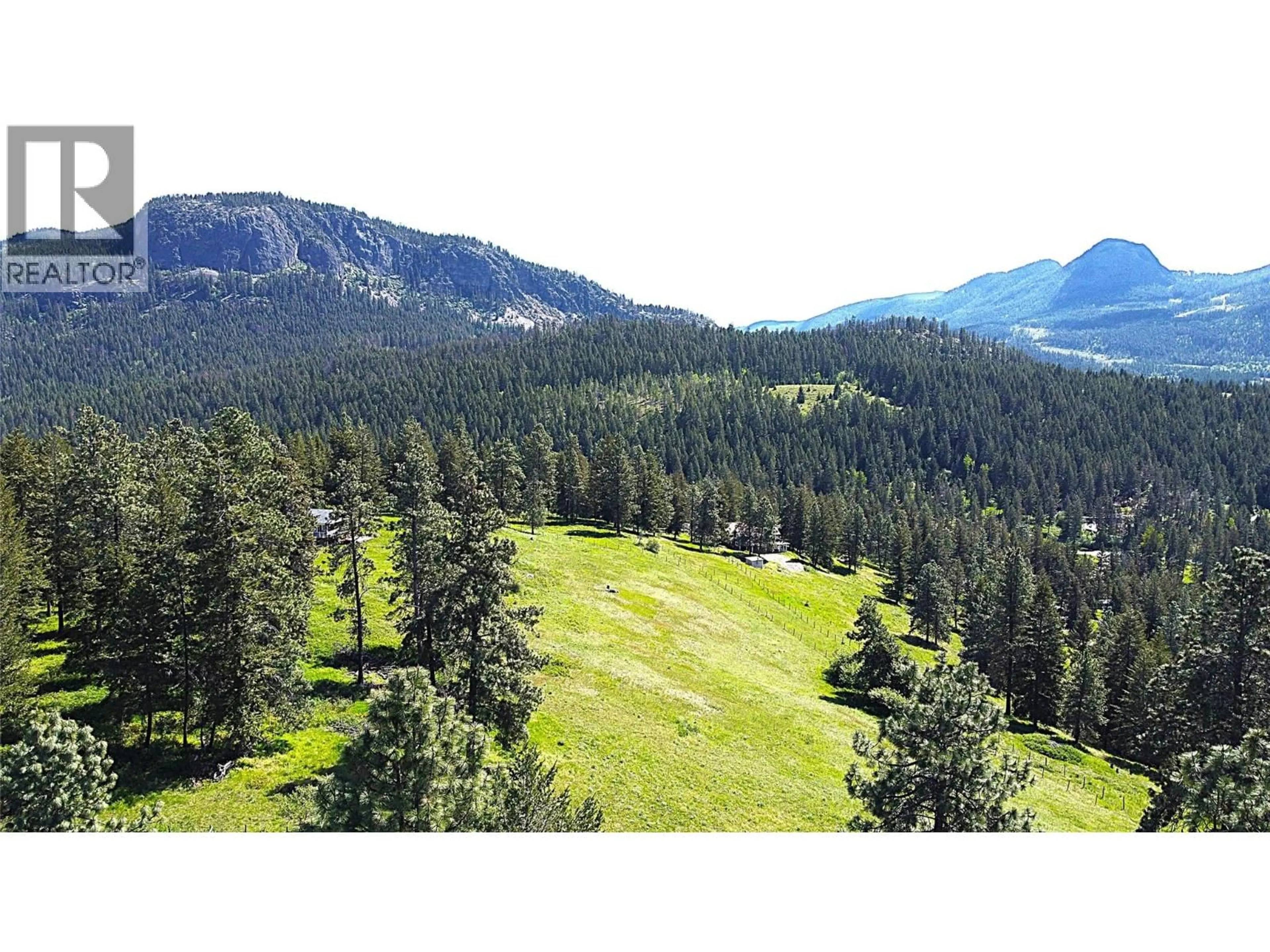 A pic from outside/outdoor area/front of a property/back of a property/a pic from drone, forest/trees view for 60 VALEVIEW ROAD, Lumby British Columbia V0E2G1