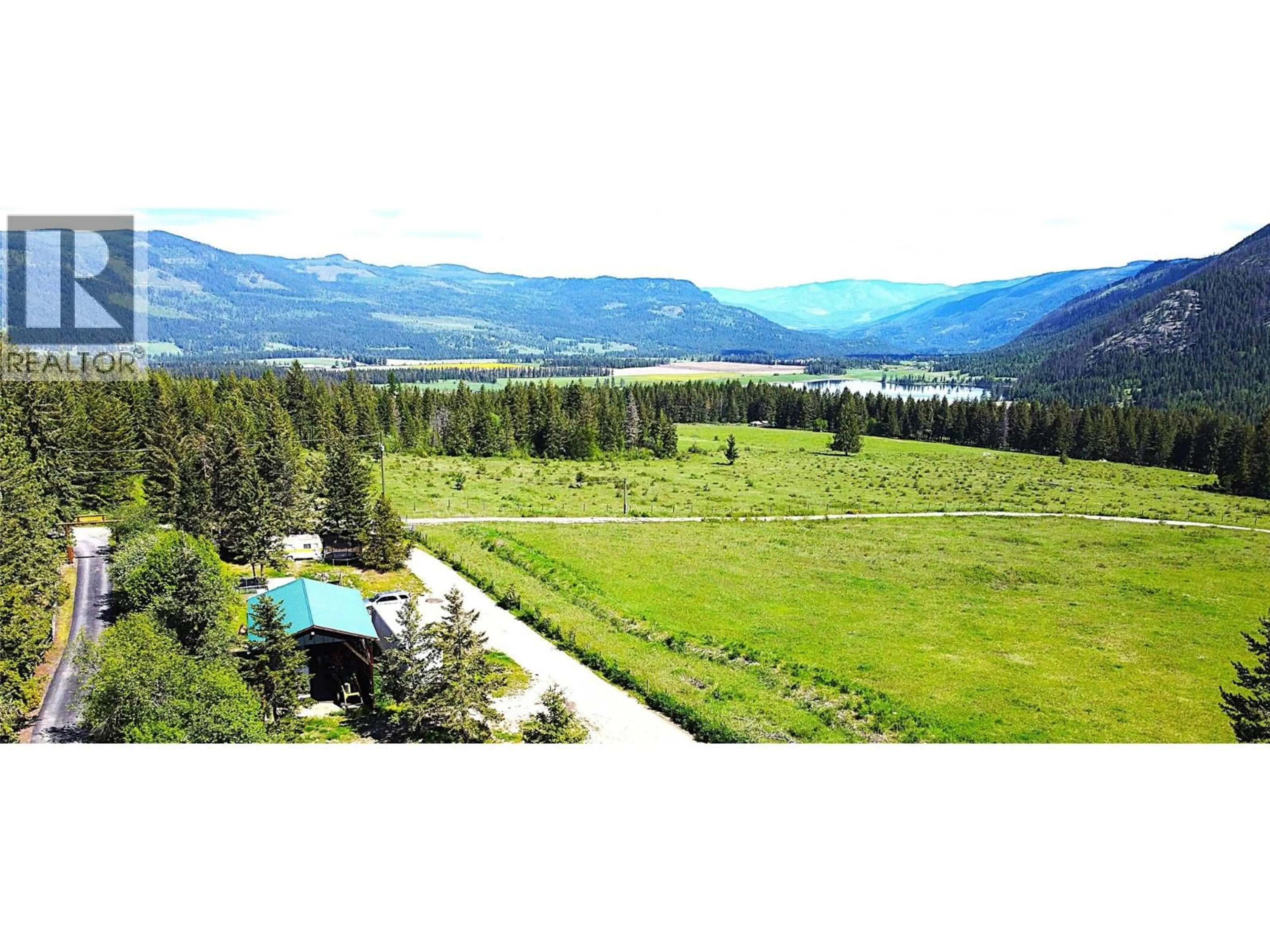 A pic from outside/outdoor area/front of a property/back of a property/a pic from drone, mountain view for 60 VALEVIEW ROAD, Lumby British Columbia V0E2G1