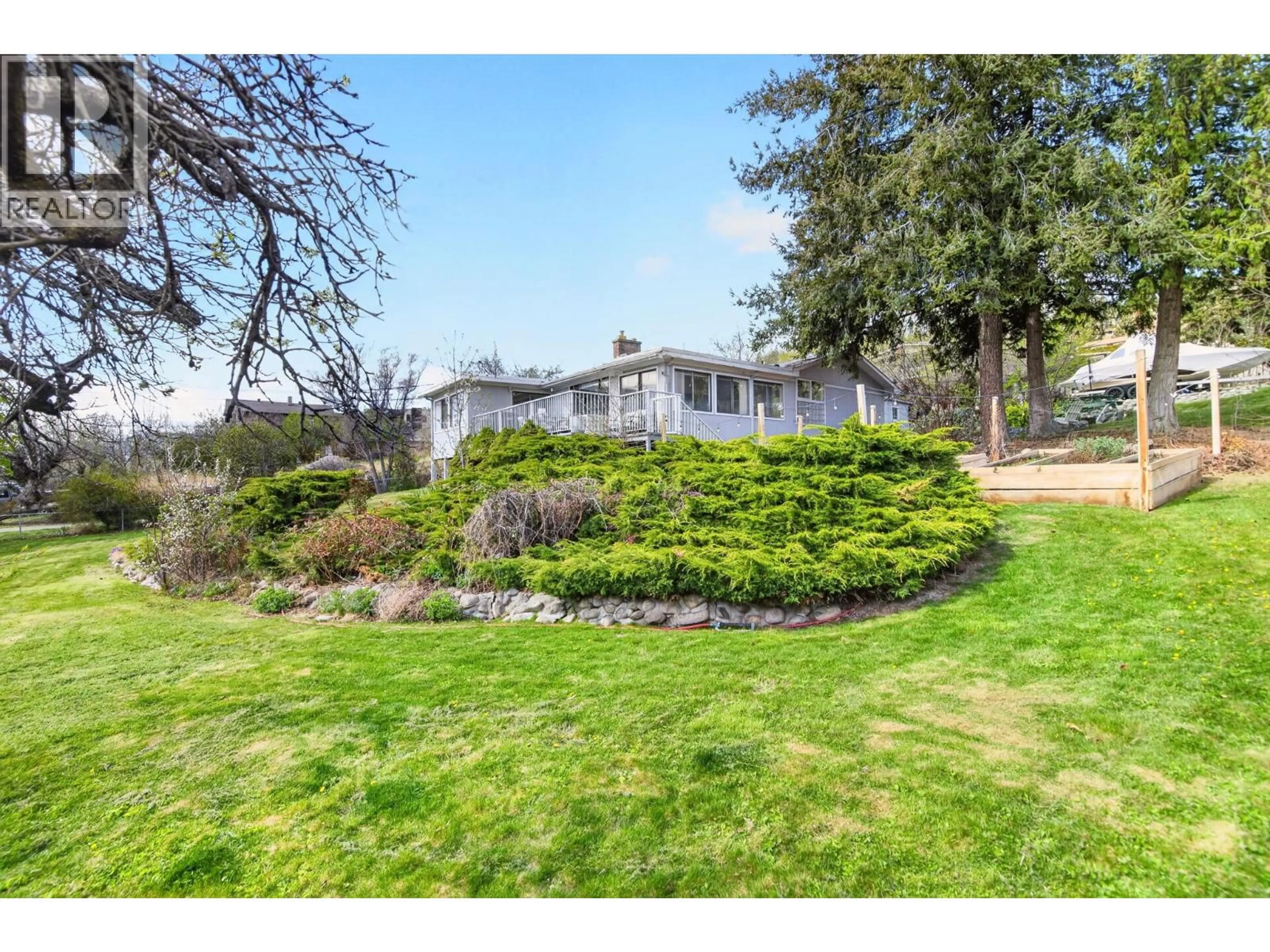 A pic from outside/outdoor area/front of a property/back of a property/a pic from drone, water/lake/river/ocean view for 5286 BUCHANAN ROAD, Peachland British Columbia V0H1X1